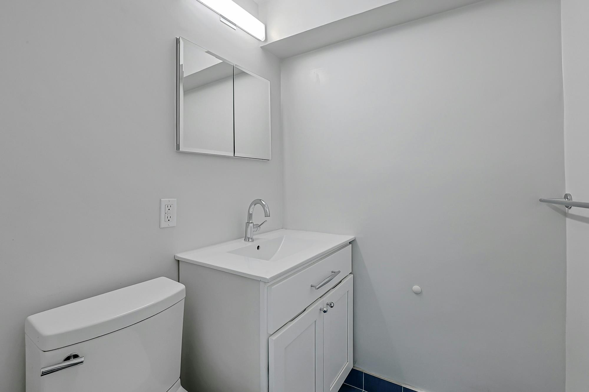 Bright & Renovated 2-Bd., 1.5-Bath Co-op with Balcony, 24-hr. Doormen & Indoor Parking at Briar Oaks
