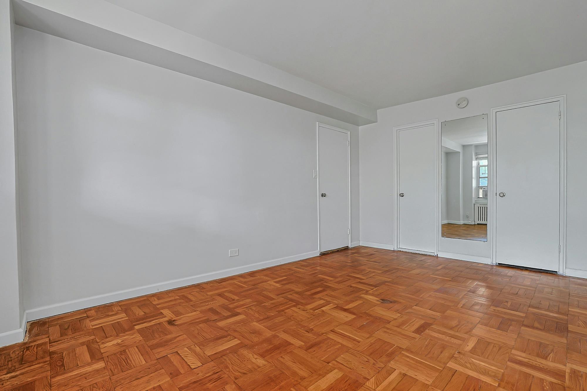 Bright & Renovated 2-Bd., 1.5-Bath Co-op with Balcony, 24-hr. Doormen & Indoor Parking at Briar Oaks