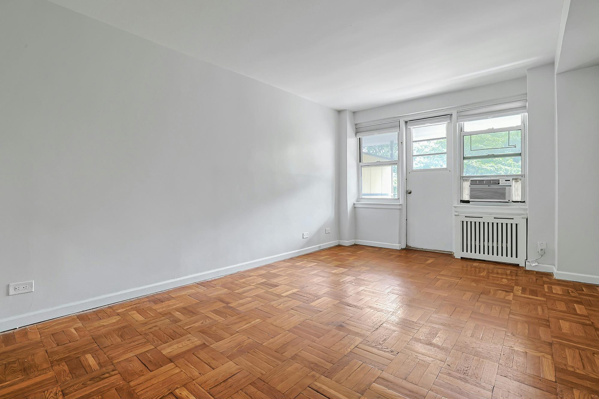 Bright & Renovated 2-Bd., 1.5-Bath Co-op with Balcony, 24-hr. Doormen & Indoor Parking at Briar Oaks