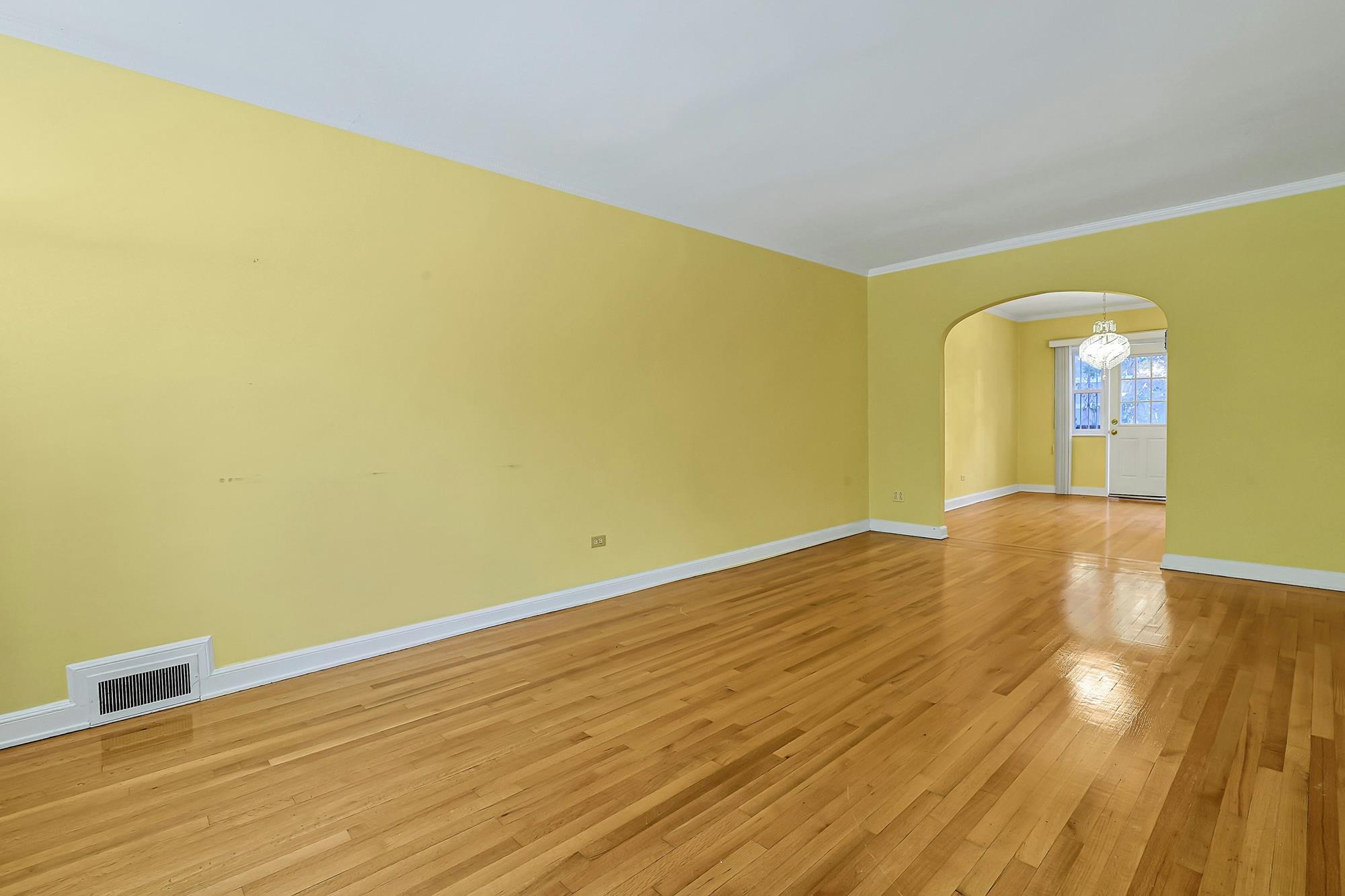 Spacious 3-Bd. Brick Townhouse with Deck & Yard on a Quiet, Tree-Lined Street