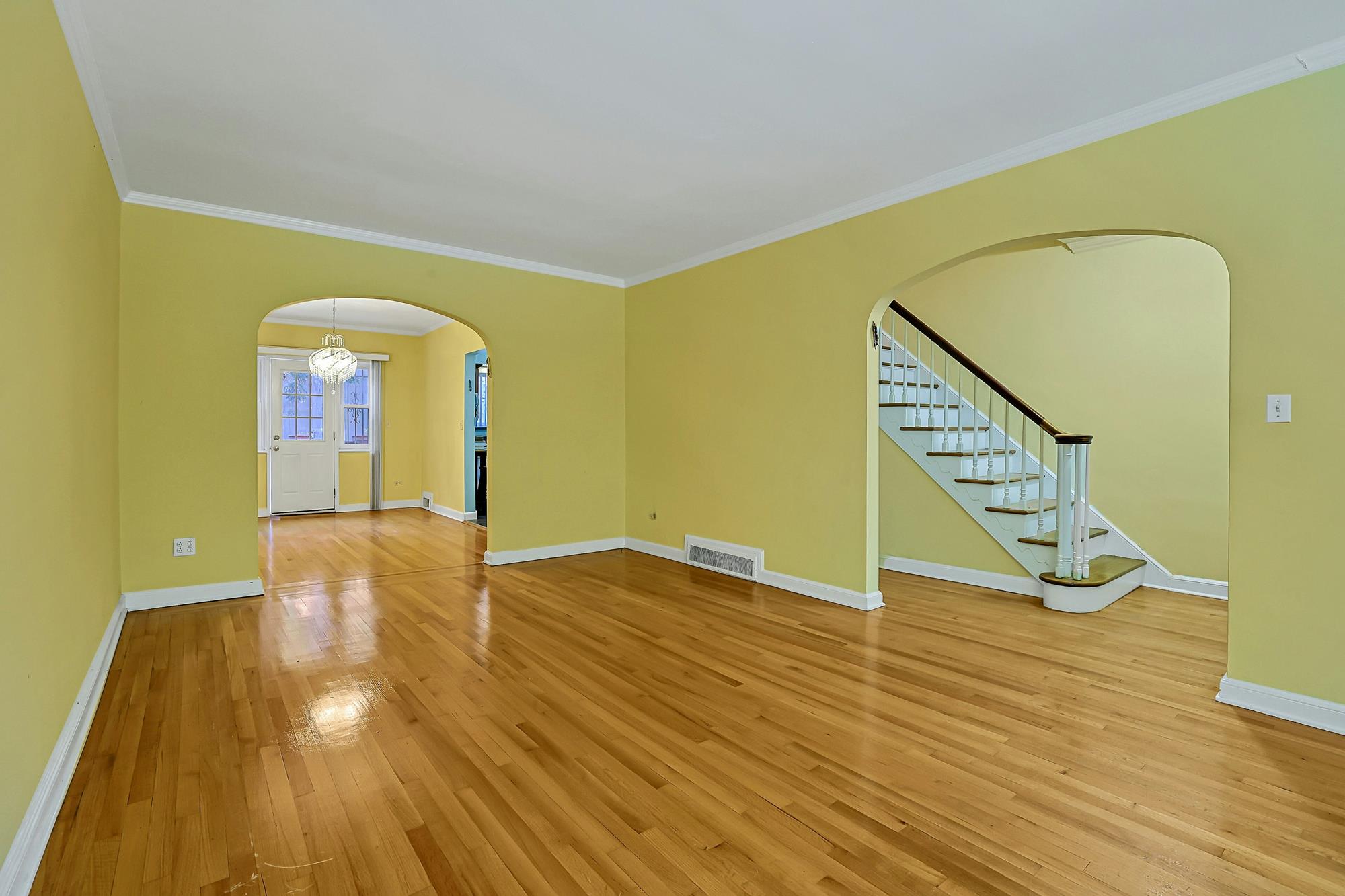Spacious 3-Bd. Brick Townhouse with Deck & Yard on a Quiet, Tree-Lined Street