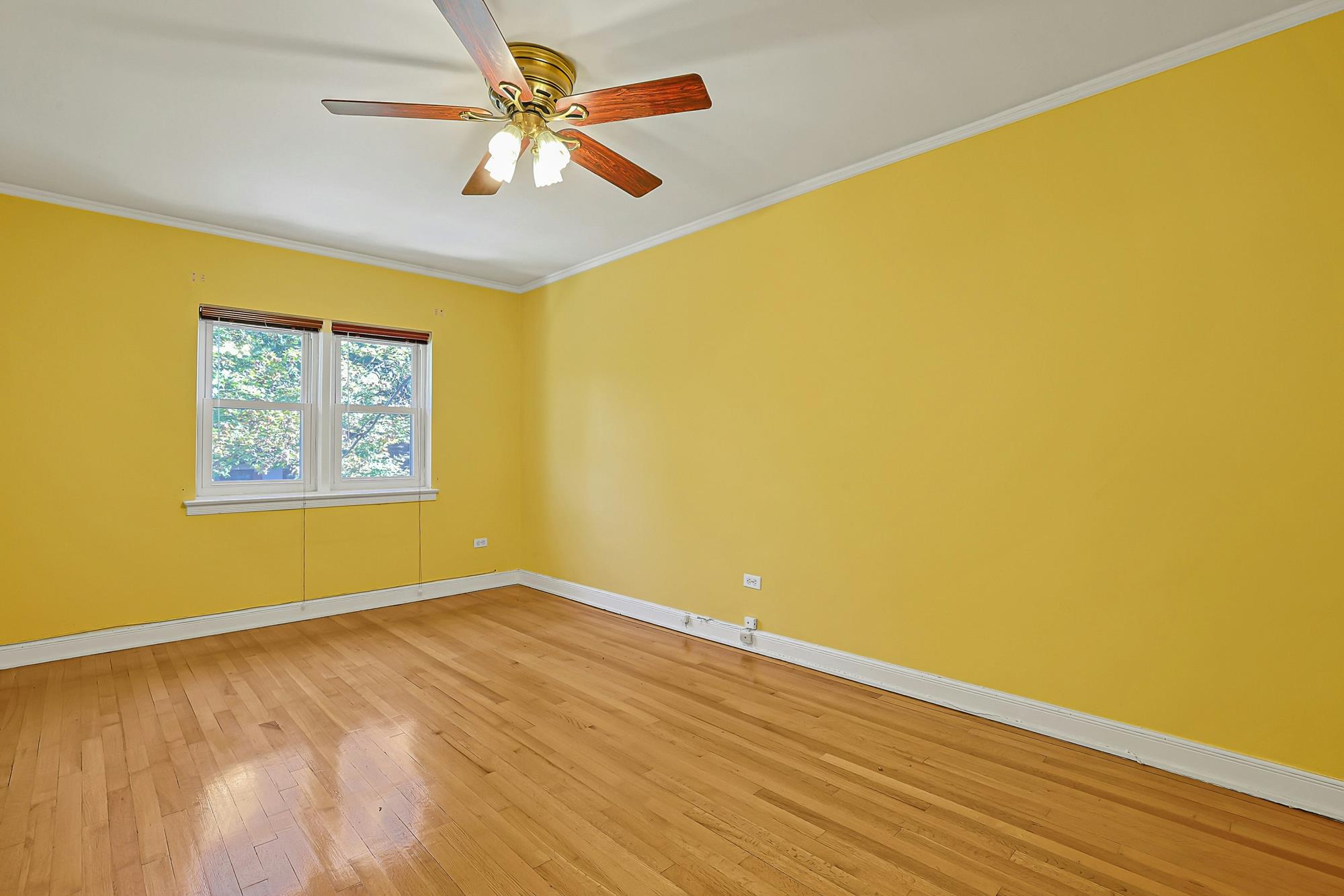 Spacious 3-Bd. Brick Townhouse with Deck & Yard on a Quiet, Tree-Lined Street