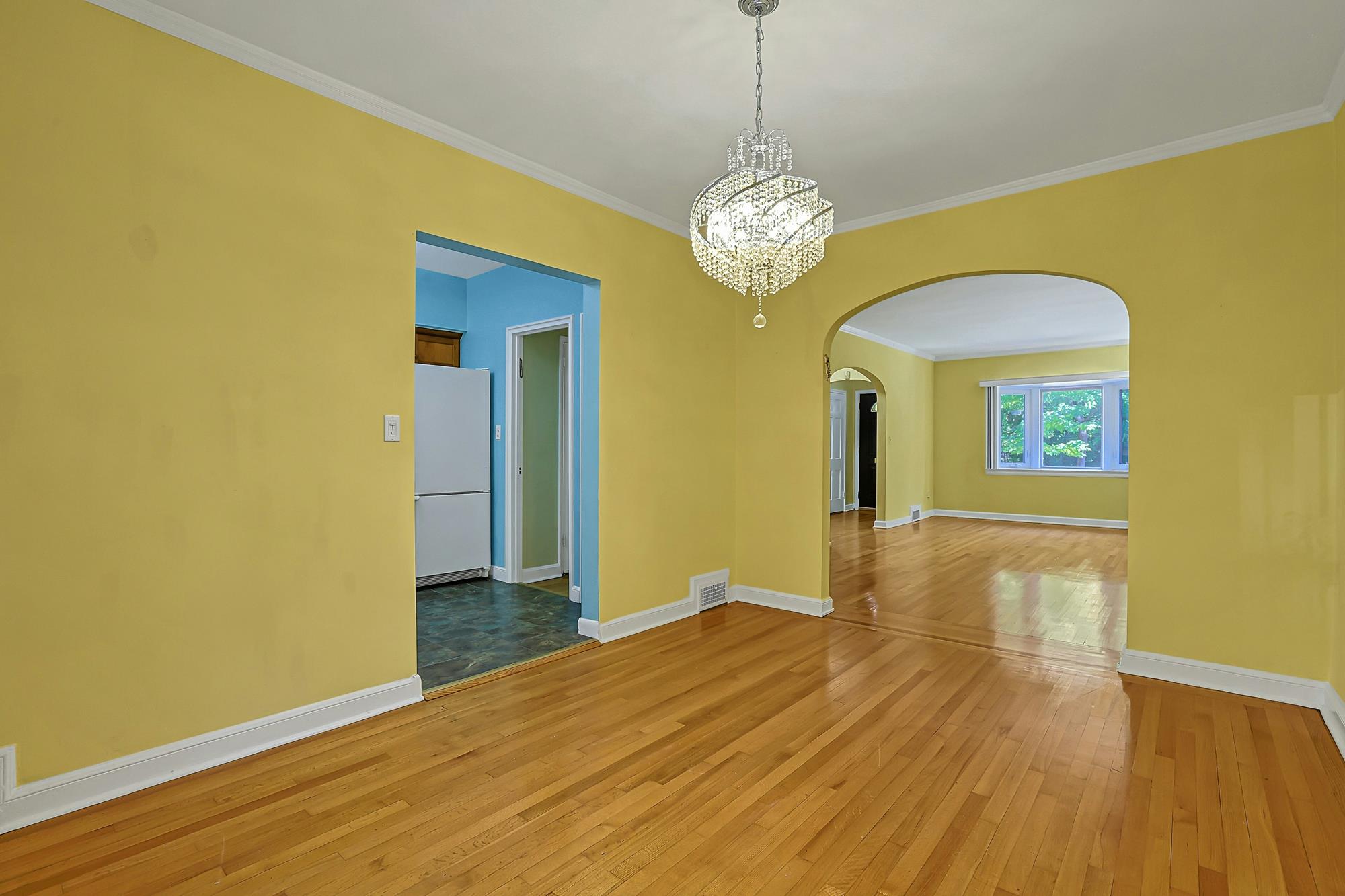 Spacious 3-Bd. Brick Townhouse with Deck & Yard on a Quiet, Tree-Lined Street