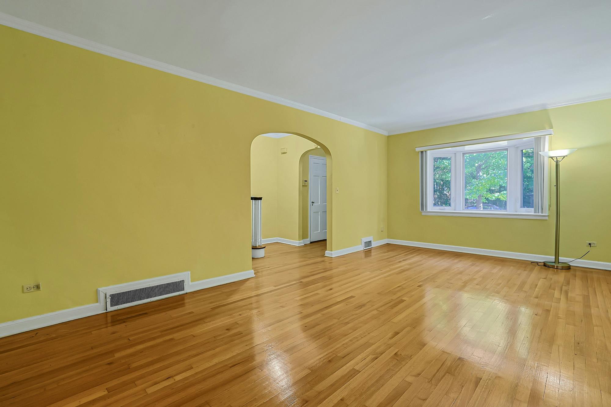 Spacious 3-Bd. Brick Townhouse with Deck & Yard on a Quiet, Tree-Lined Street