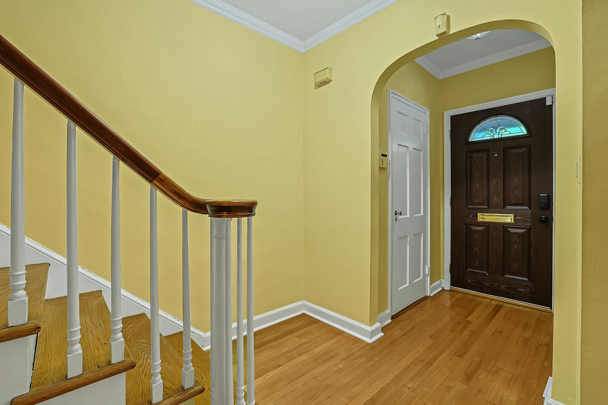 Spacious 3-Bd. Brick Townhouse with Deck & Yard on a Quiet, Tree-Lined Street