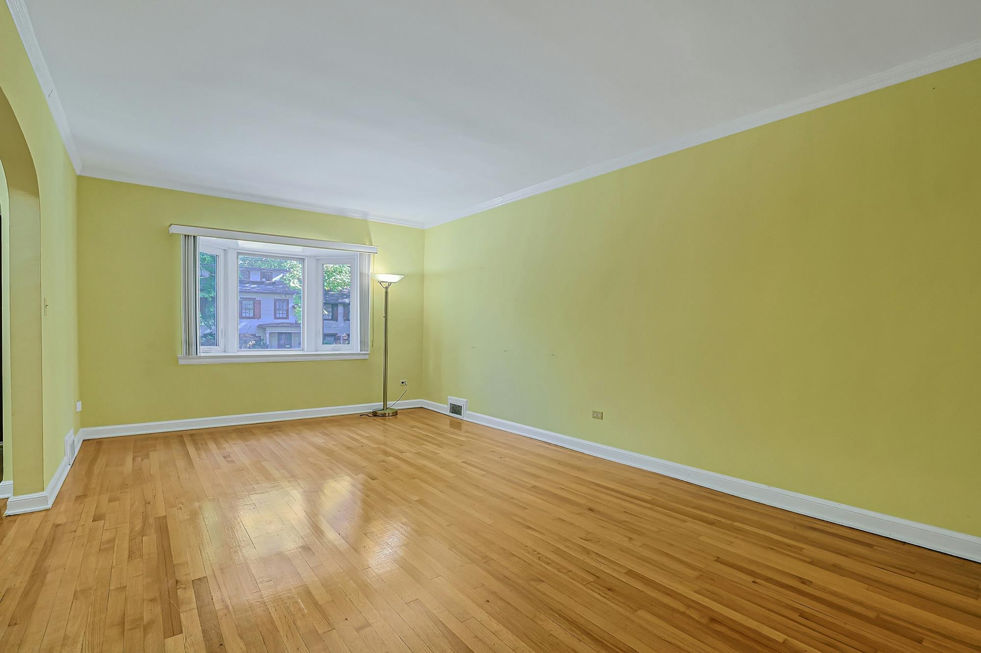 Spacious 3-Bd. Brick Townhouse with Deck & Yard on a Quiet, Tree-Lined Street