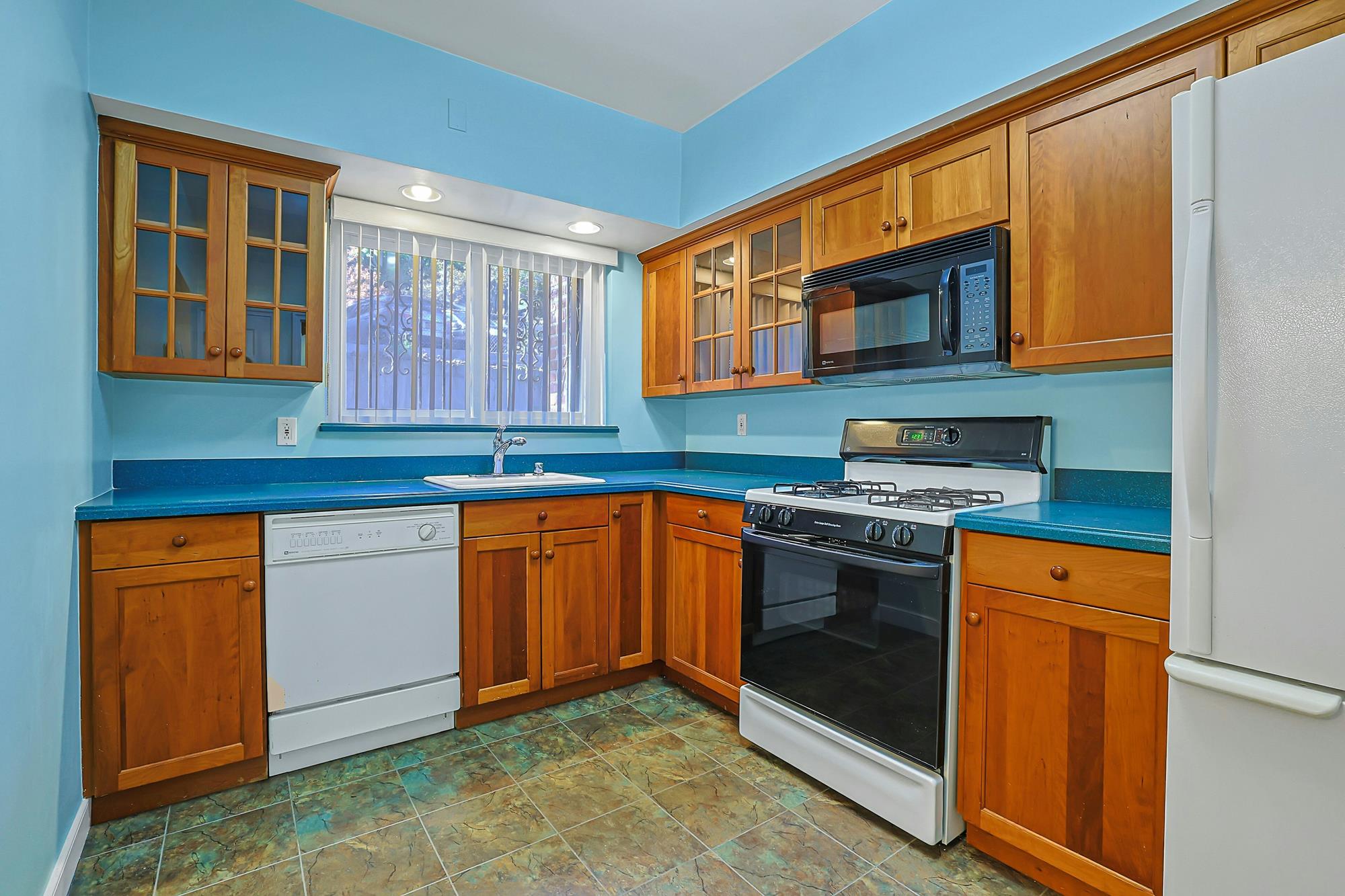 Spacious 3-Bd. Brick Townhouse with Deck & Yard on a Quiet, Tree-Lined Street