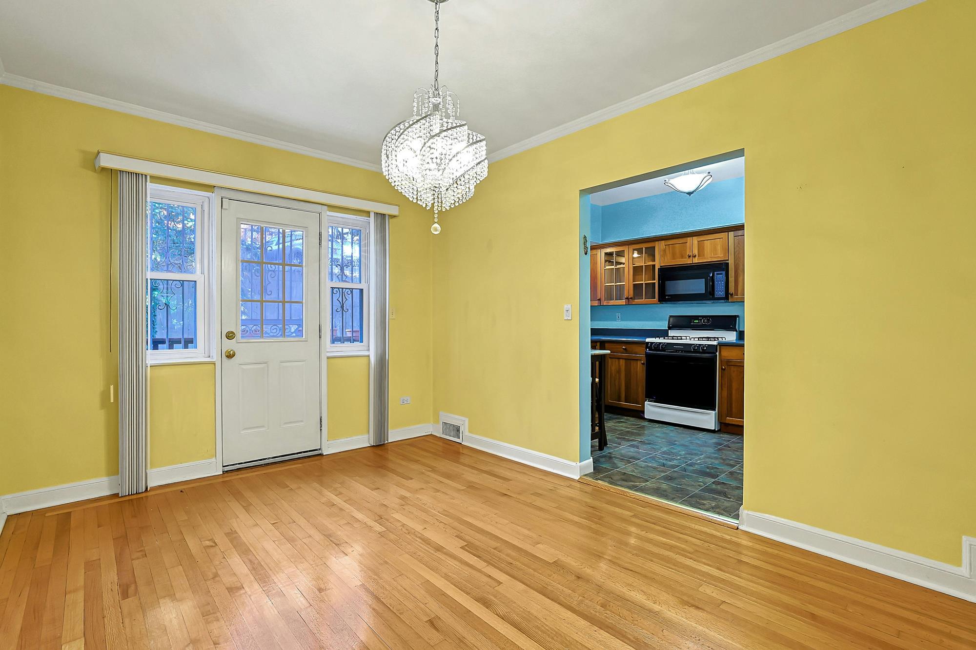 Spacious 3-Bd. Brick Townhouse with Deck & Yard on a Quiet, Tree-Lined Street