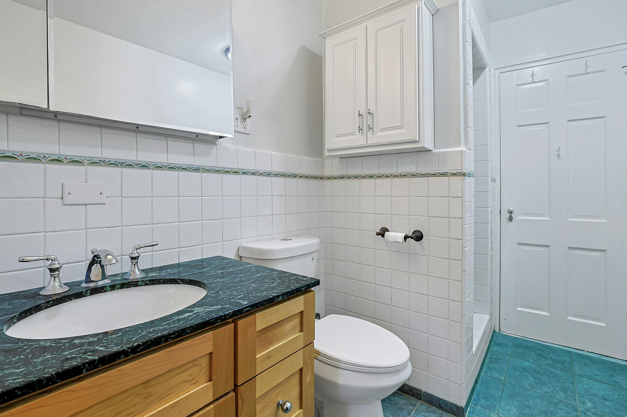 Spacious 3-Bd. Brick Townhouse with Deck & Yard on a Quiet, Tree-Lined Street