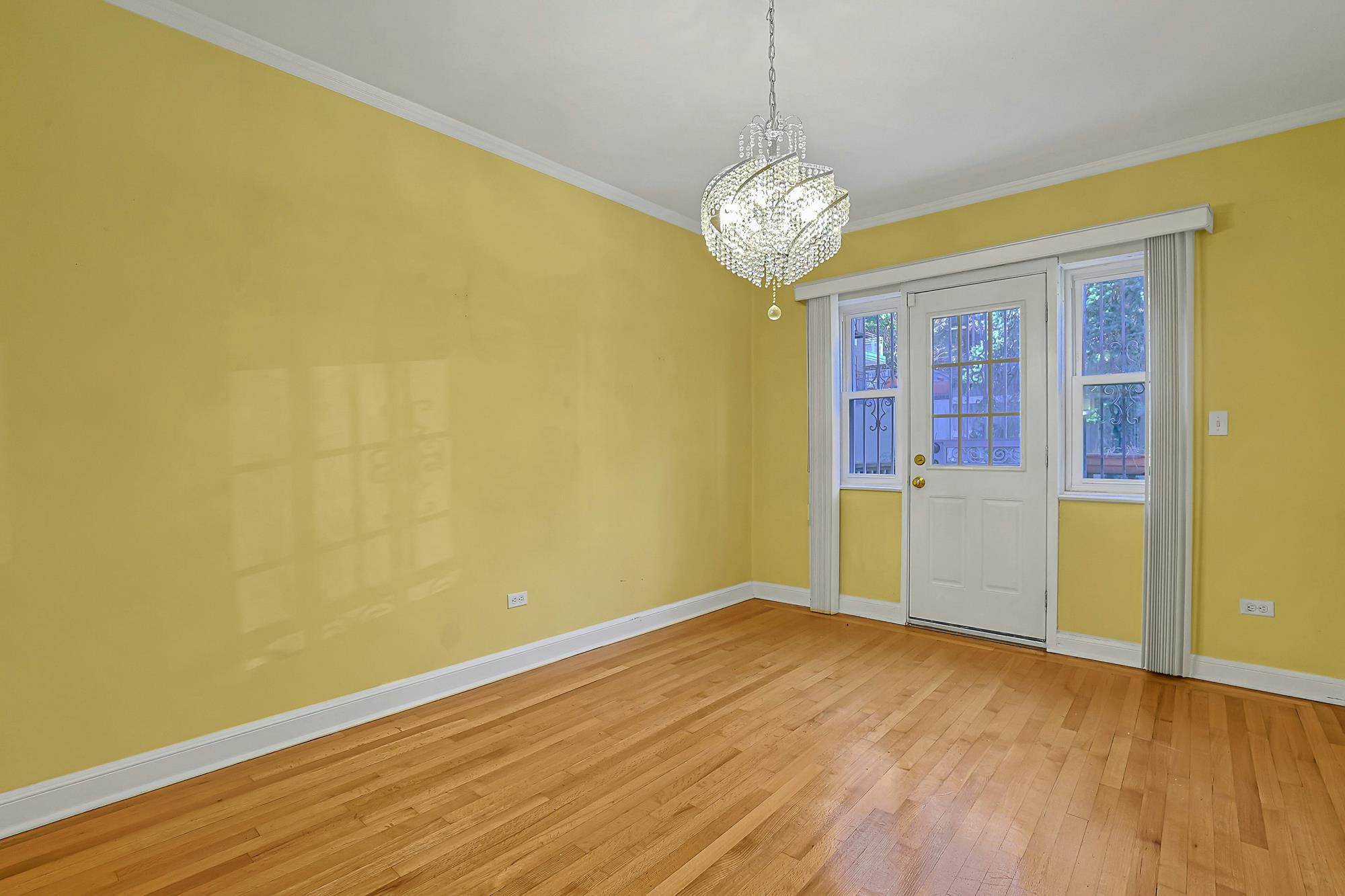 Spacious 3-Bd. Brick Townhouse with Deck & Yard on a Quiet, Tree-Lined Street
