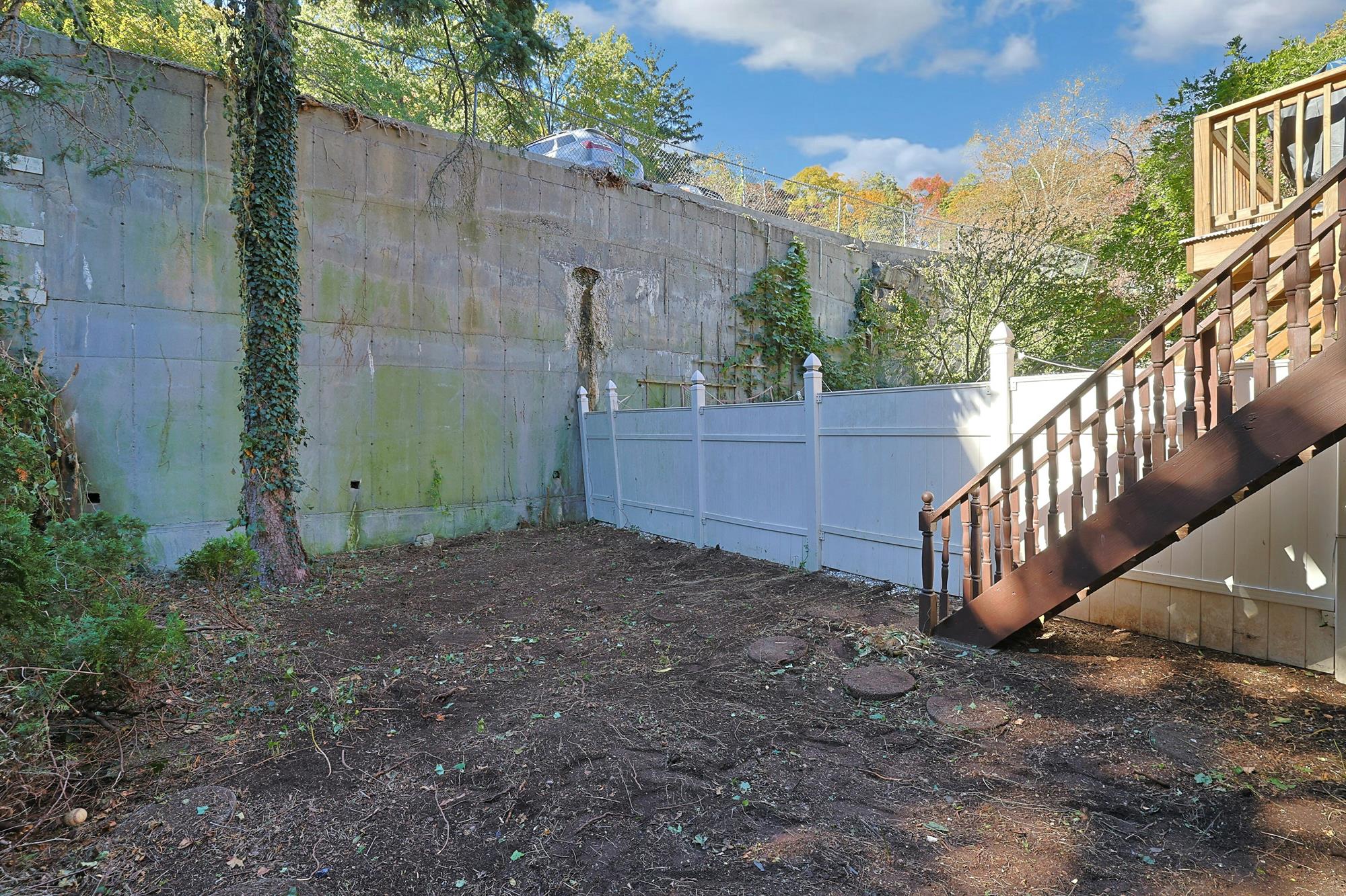 Spacious 3-Bd. Brick Townhouse with Deck & Yard on a Quiet, Tree-Lined Street