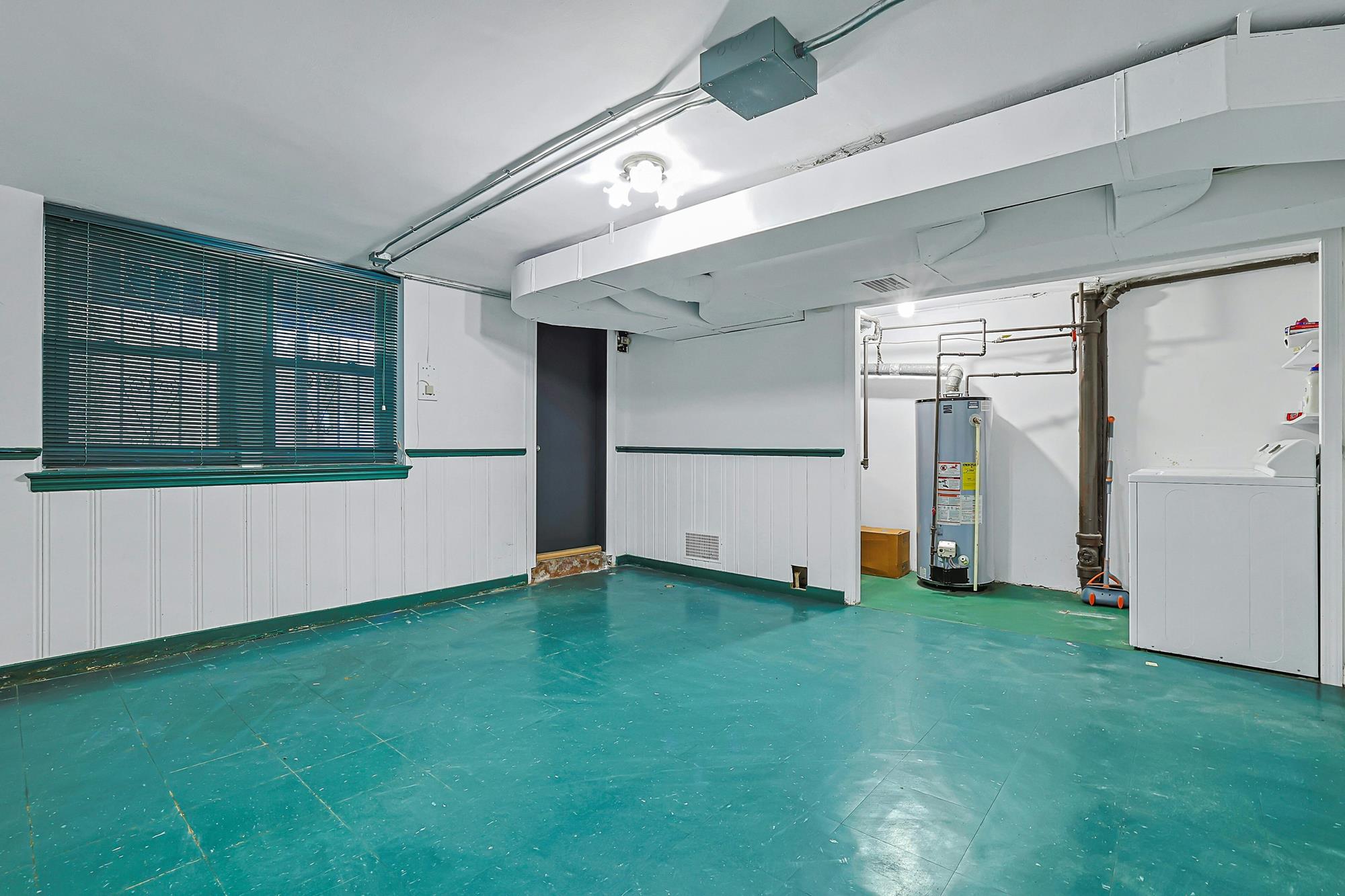Spacious 3-Bd. Brick Townhouse with Deck & Yard on a Quiet, Tree-Lined Street