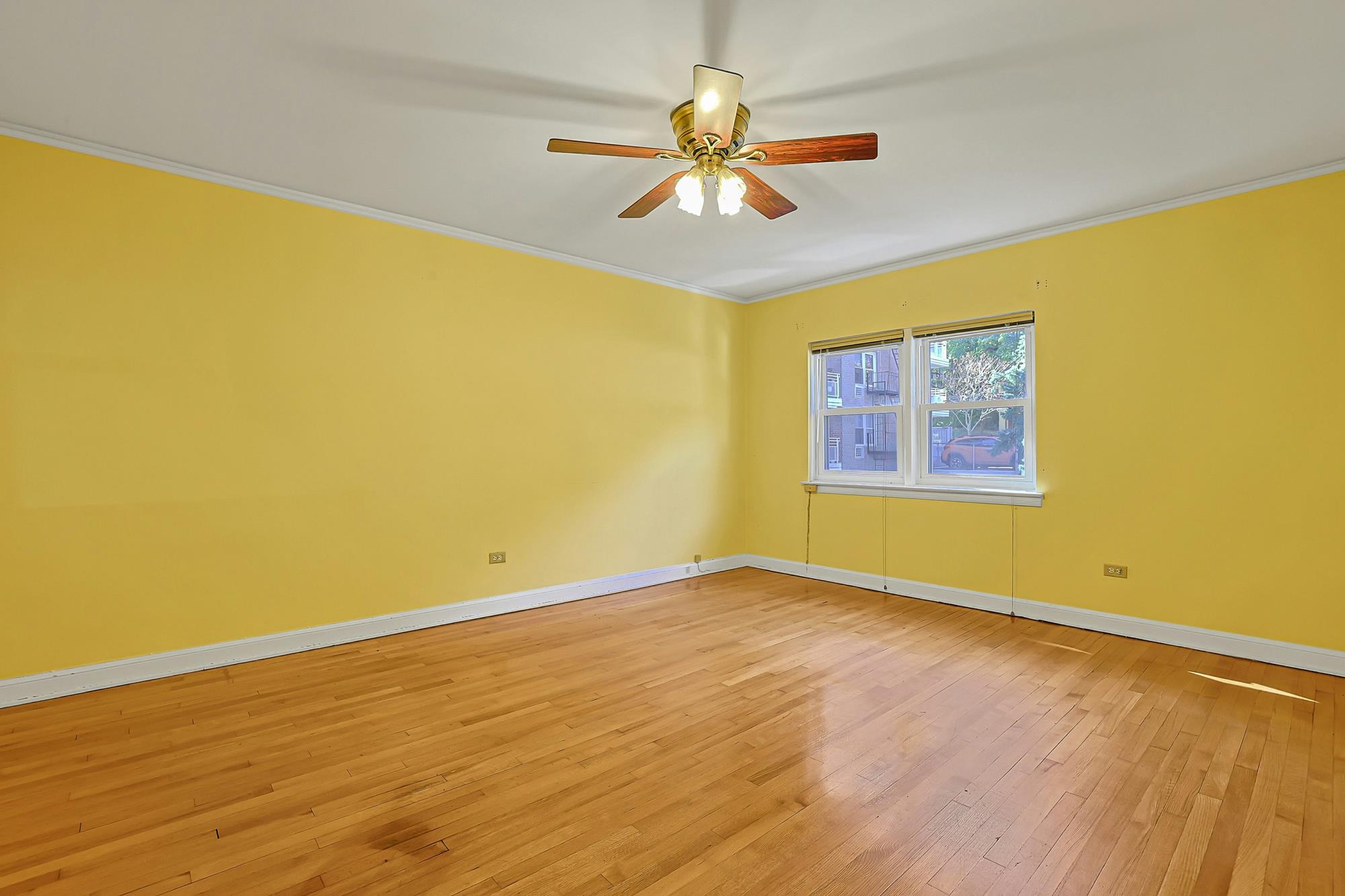 Spacious 3-Bd. Brick Townhouse with Deck & Yard on a Quiet, Tree-Lined Street