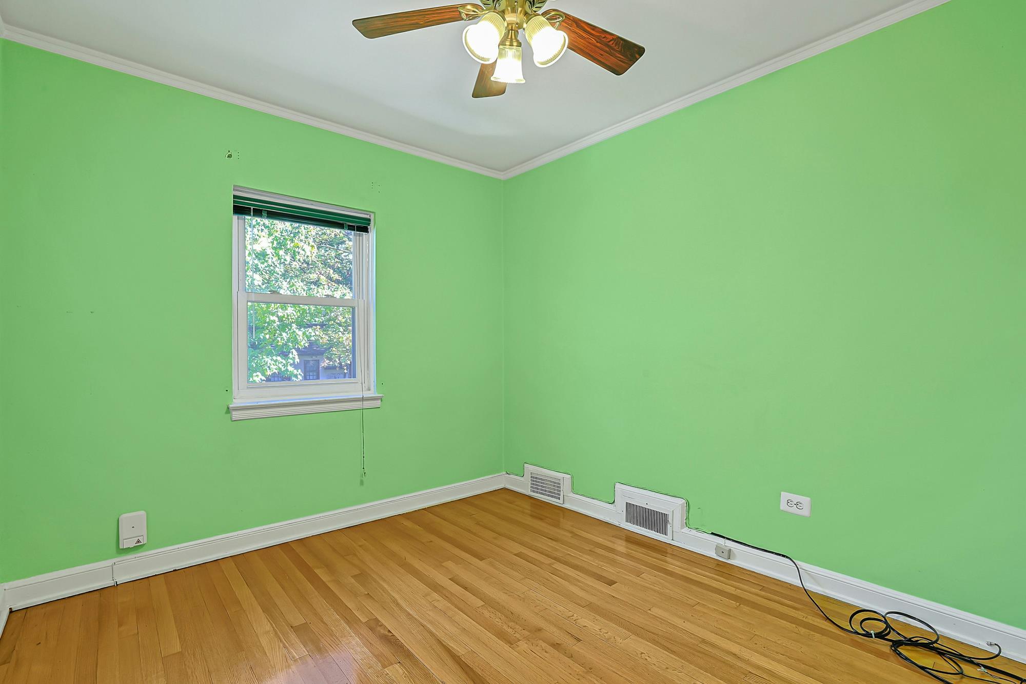 Spacious 3-Bd. Brick Townhouse with Deck & Yard on a Quiet, Tree-Lined Street