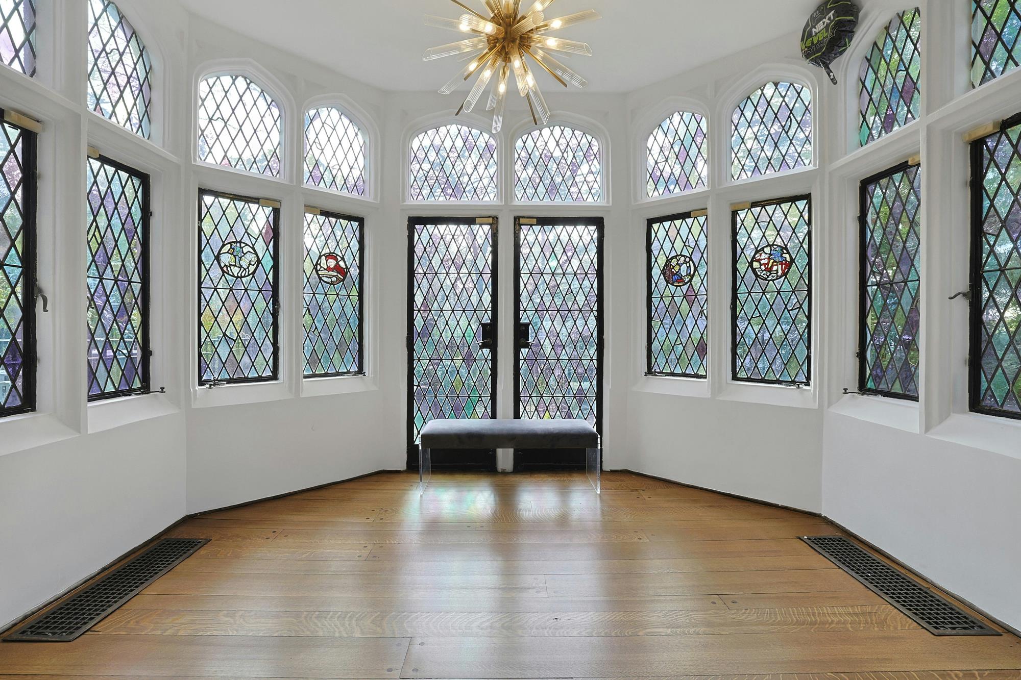 Grand & Classic 8-Bd. 1920s Tudor-Style Mansion with Guest House, Office Cottage, Patio & Level, Grassy Yard on Cul-de-Sac