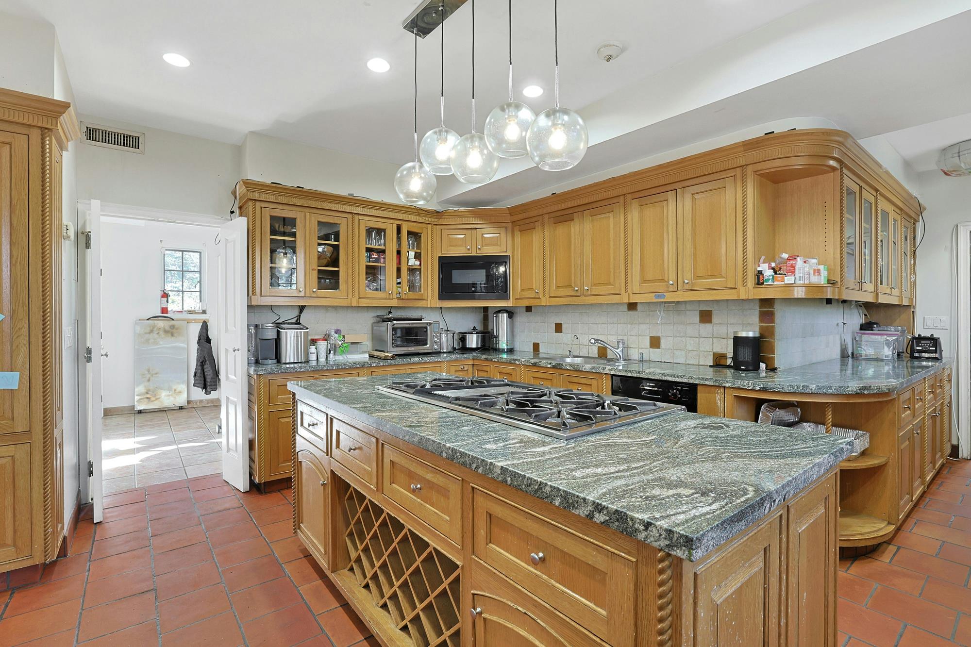 Grand & Classic 8-Bd. 1920s Tudor-Style Mansion with Guest House, Office Cottage, Patio & Level, Grassy Yard on Cul-de-Sac