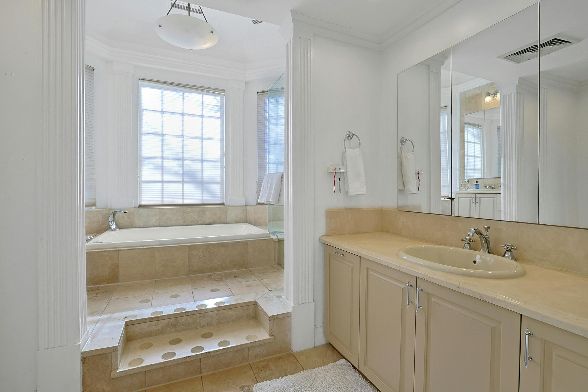 Grand & Classic 8-Bd. 1920s Tudor-Style Mansion with Guest House, Office Cottage, Patio & Level, Grassy Yard on Cul-de-Sac