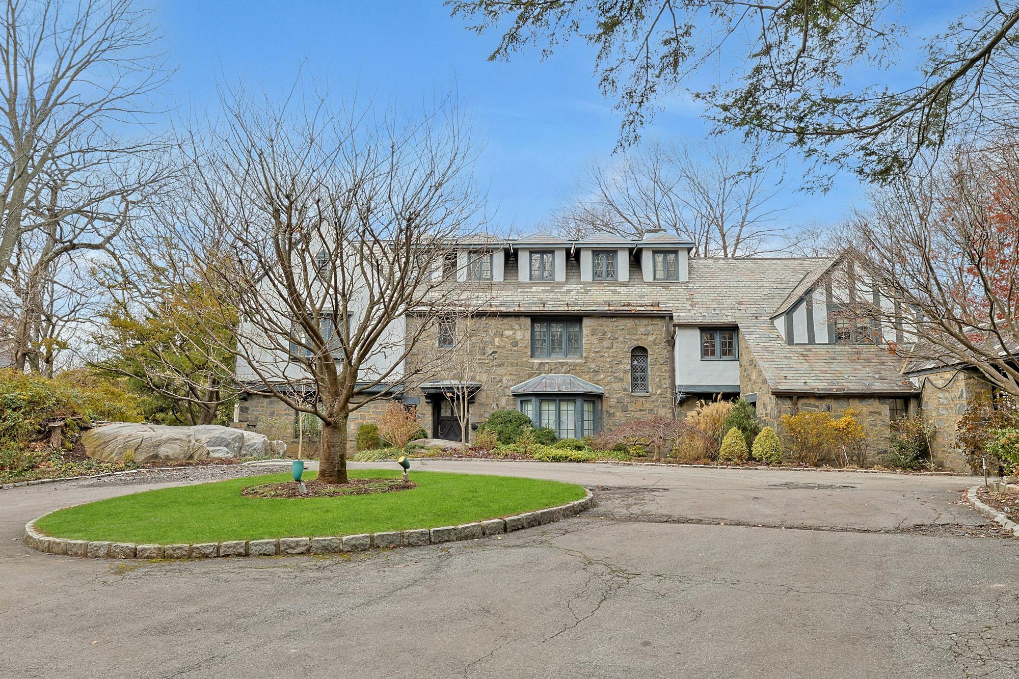 Grand & Classic 8-Bd. 1920s Tudor-Style Mansion with Guest House, Office Cottage, Patio & Level, Grassy Yard on Cul-de-Sac