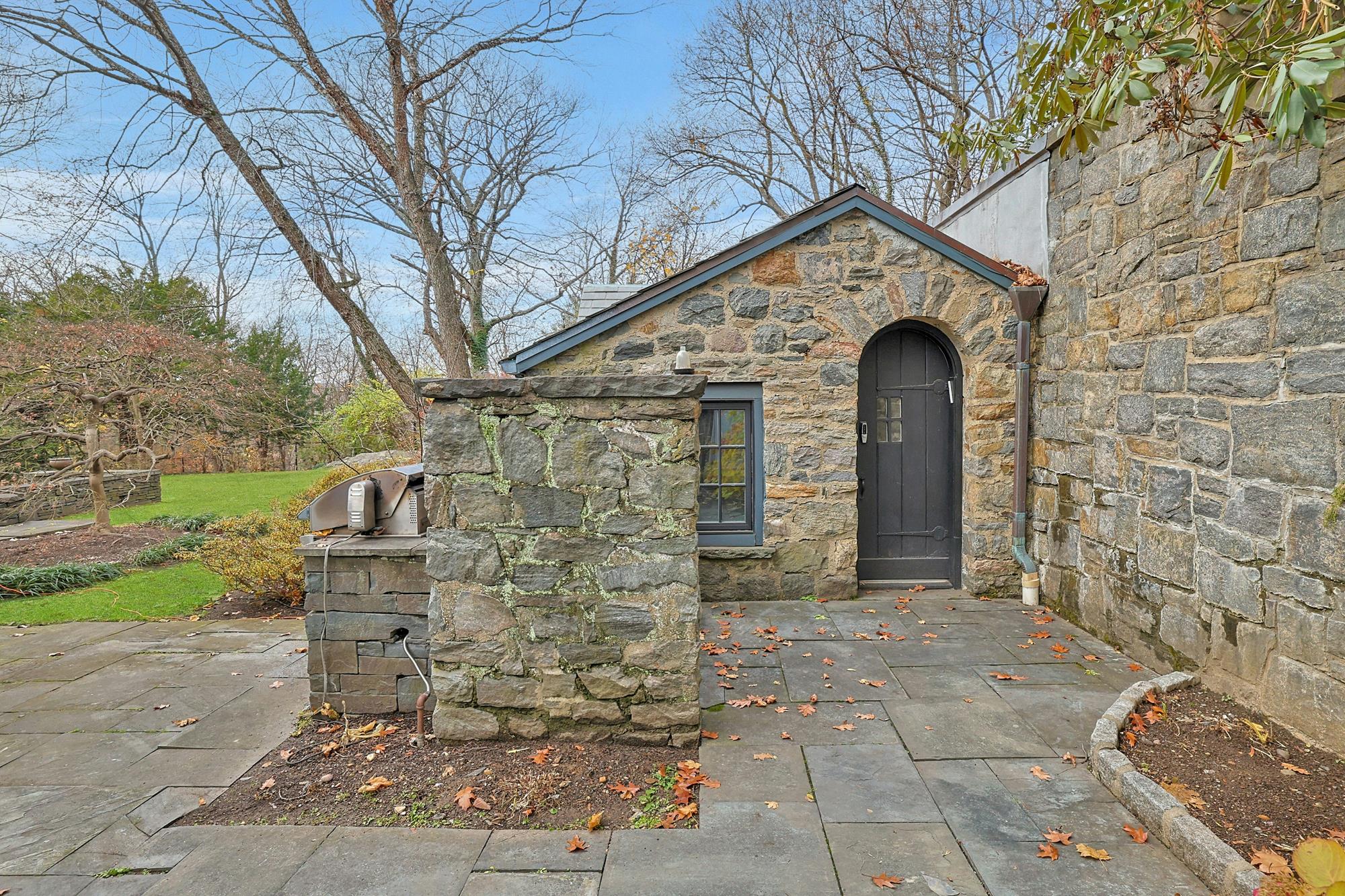 Grand & Classic 8-Bd. 1920s Tudor-Style Mansion with Guest House, Office Cottage, Patio & Level, Grassy Yard on Cul-de-Sac