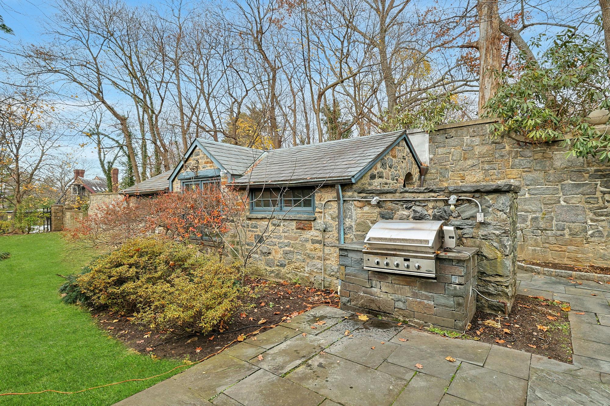 Grand & Classic 8-Bd. 1920s Tudor-Style Mansion with Guest House, Office Cottage, Patio & Level, Grassy Yard on Cul-de-Sac