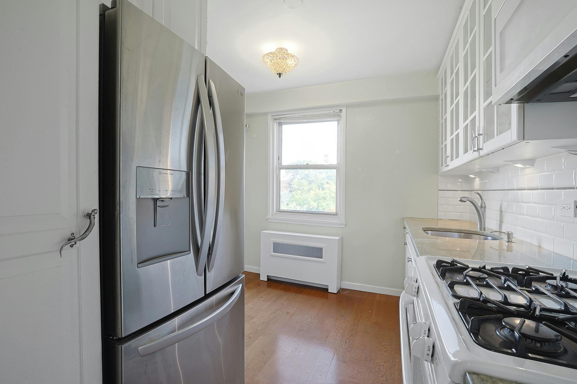 Spacious Junior-4 Co-op with Guest Room, Enclosed Balcony, Hudson River View & 24-Hr. Doormen