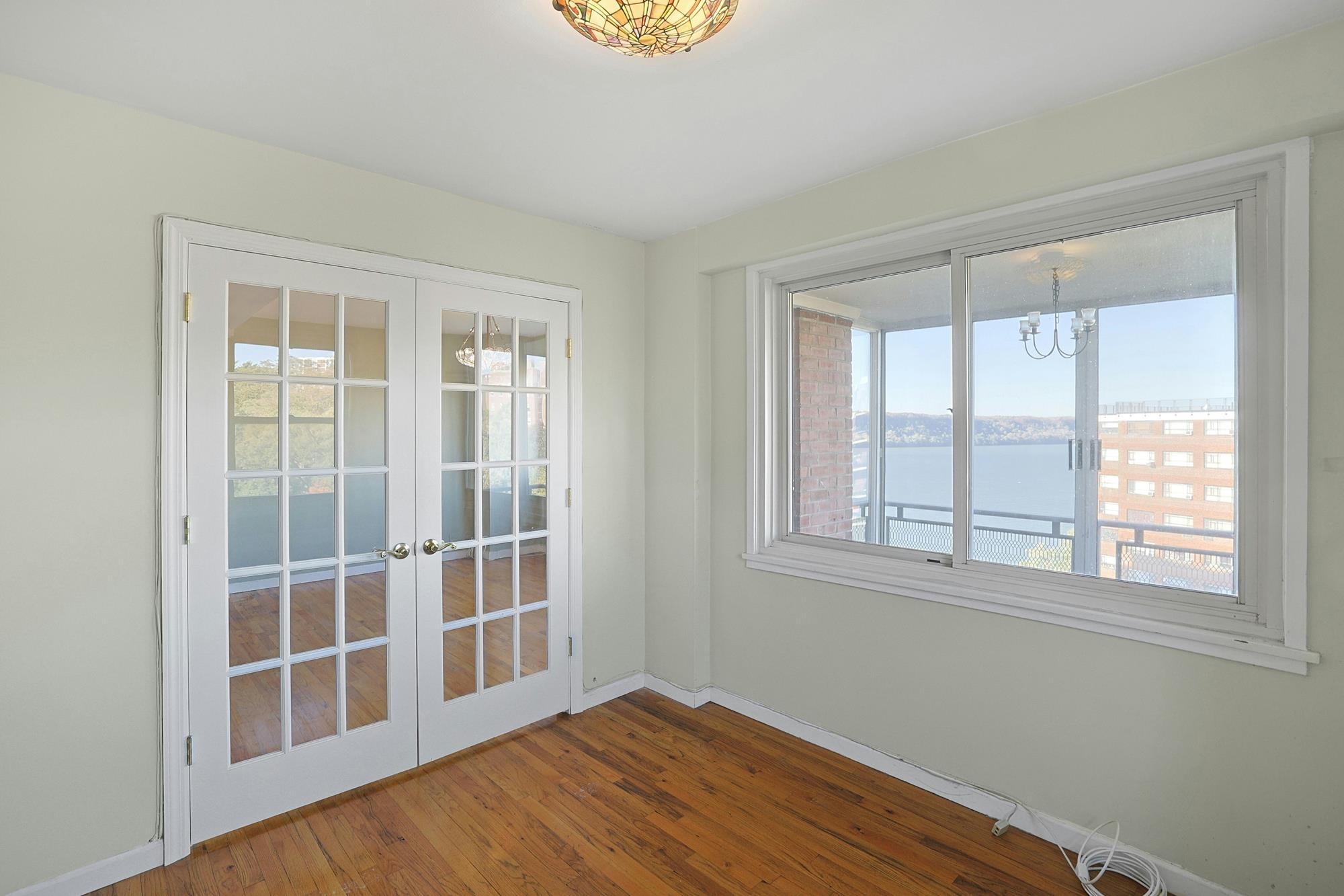 Spacious Junior-4 Co-op with Guest Room, Enclosed Balcony, Hudson River View & 24-Hr. Doormen