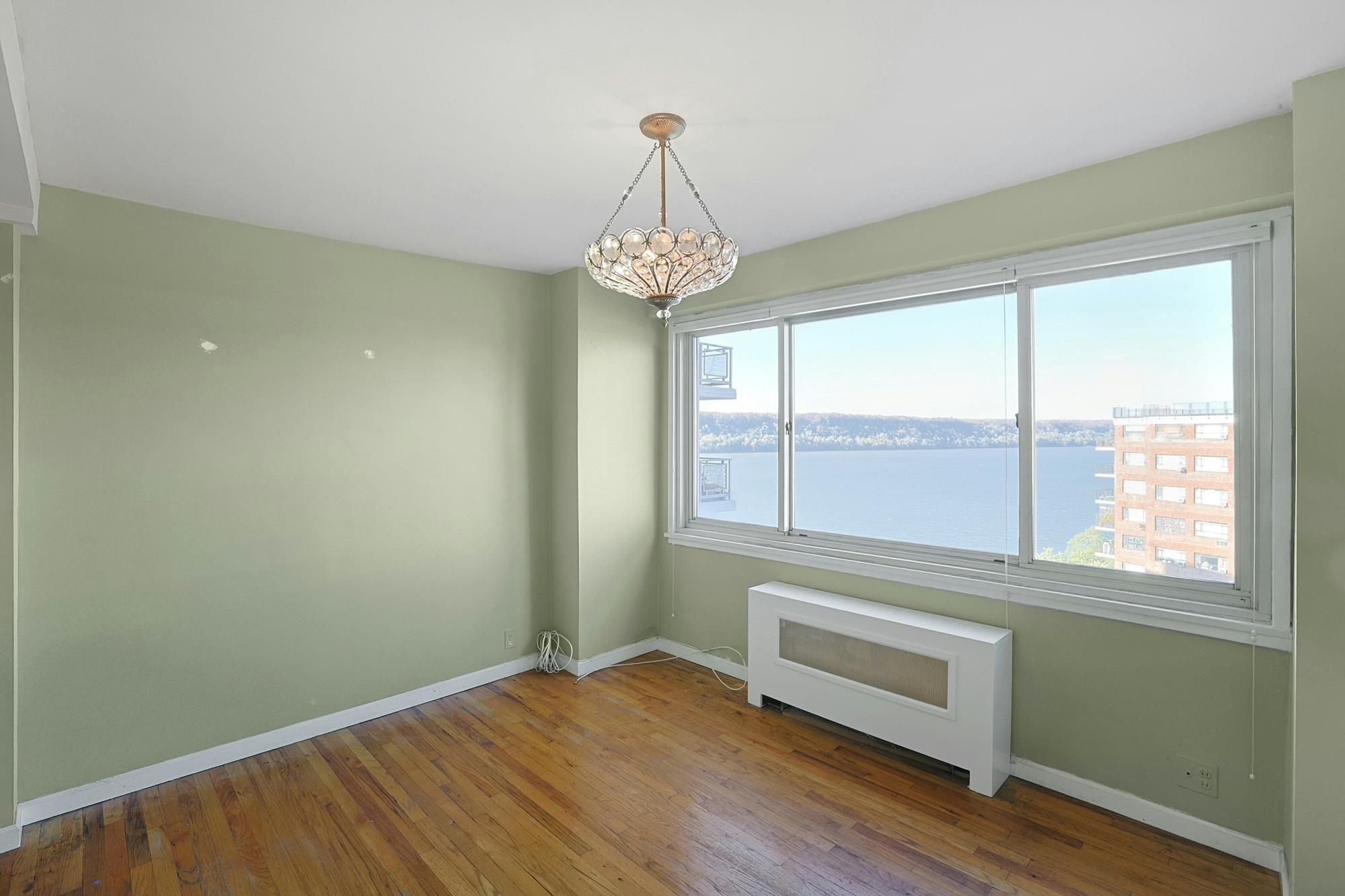Spacious Junior-4 Co-op with Guest Room, Enclosed Balcony, Hudson River View & 24-Hr. Doormen