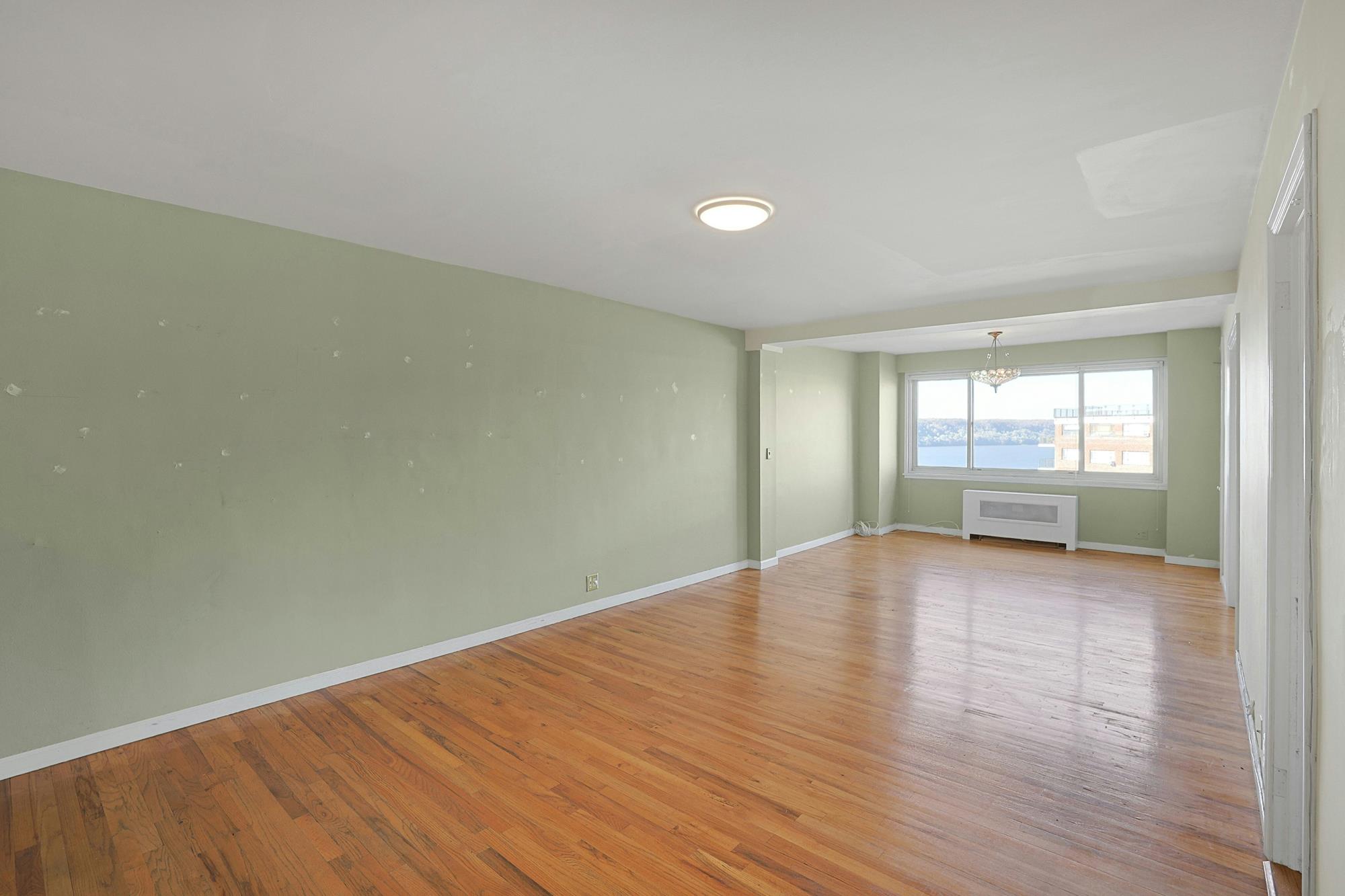 Spacious Junior-4 Co-op with Guest Room, Enclosed Balcony, Hudson River View & 24-Hr. Doormen
