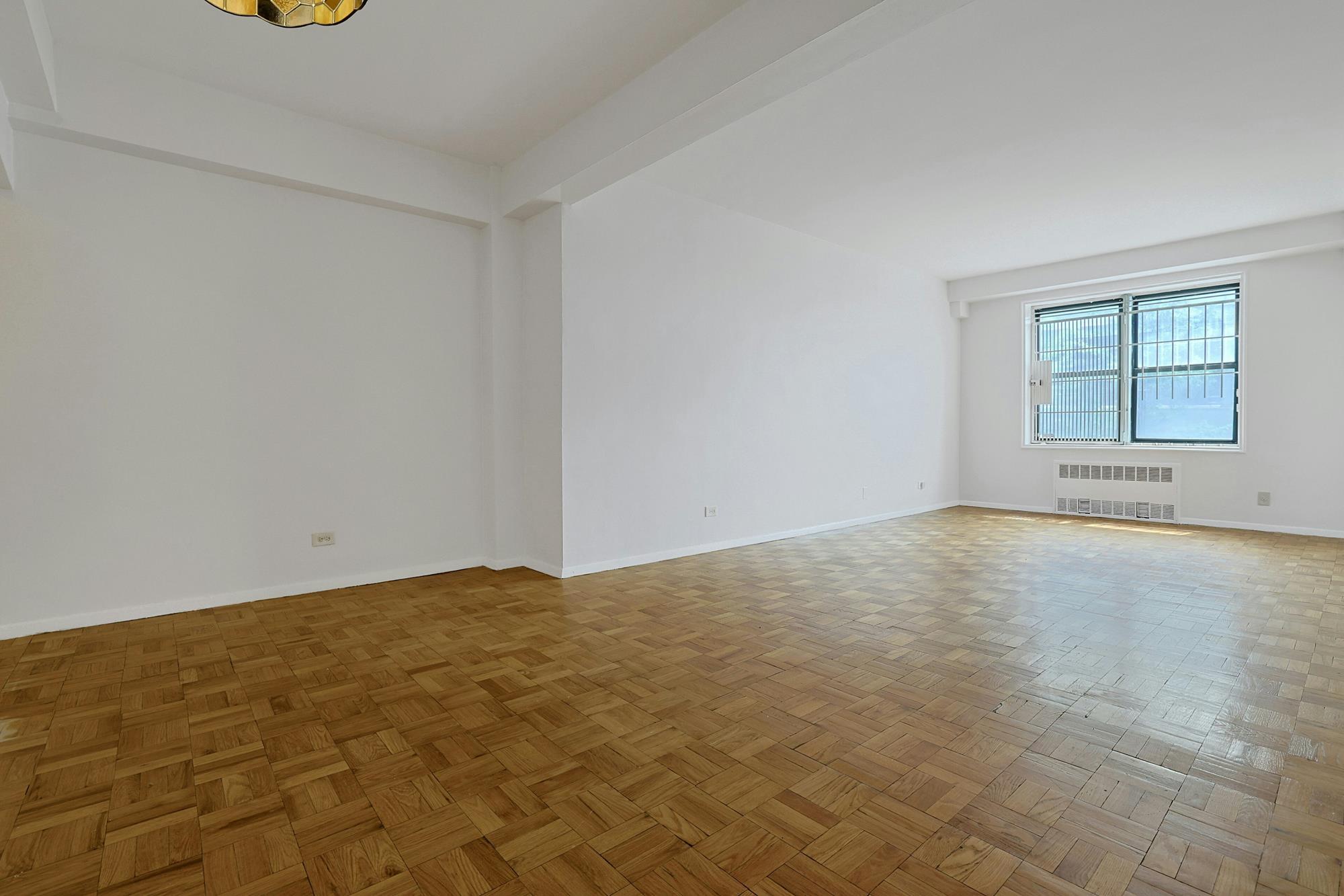 Lobby-Level Junior-4 (Convertible to 2-Bd.) Co-op with Doormen & Parking Availability