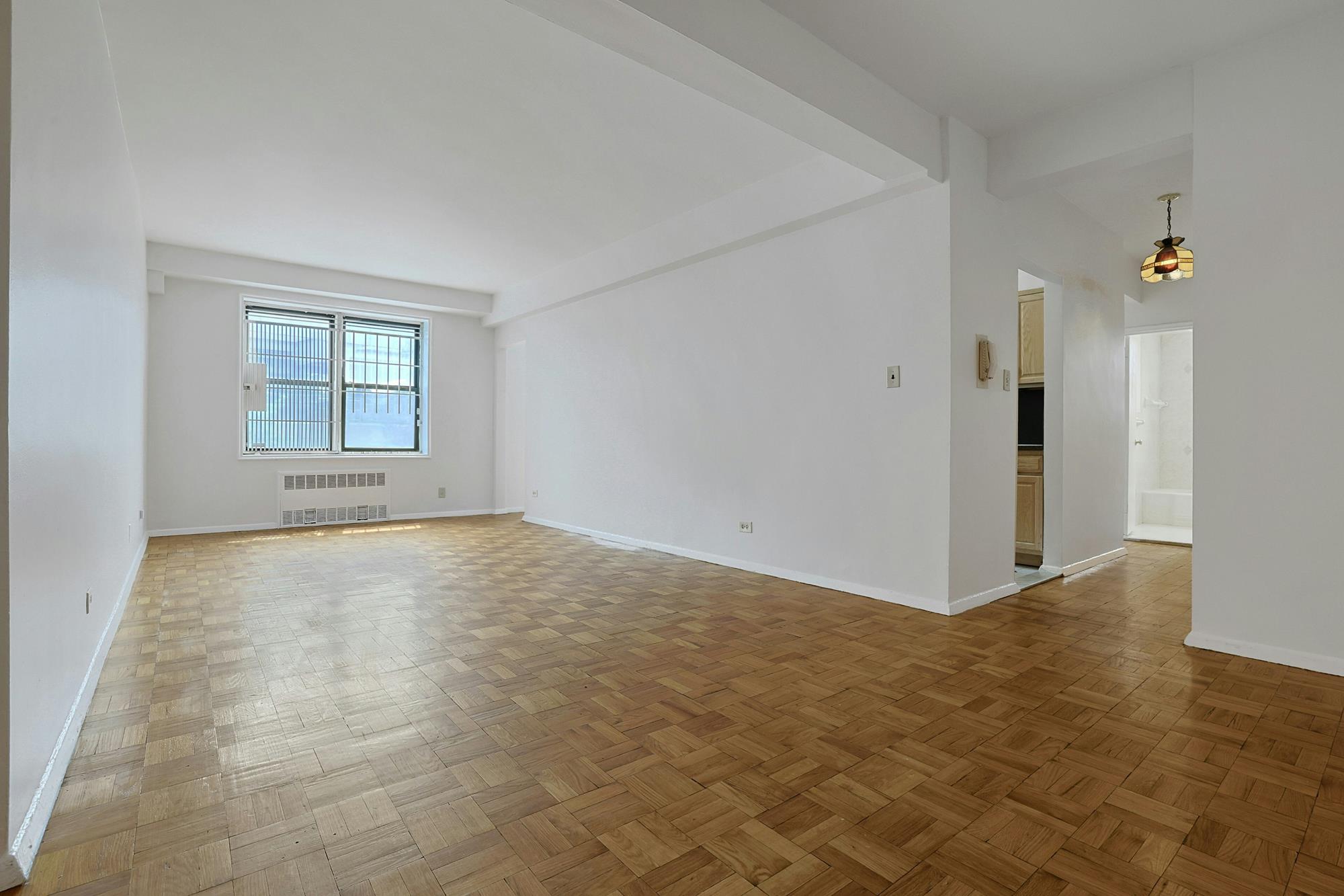 Lobby-Level Junior-4 (Convertible to 2-Bd.) Co-op with Doormen & Parking Availability