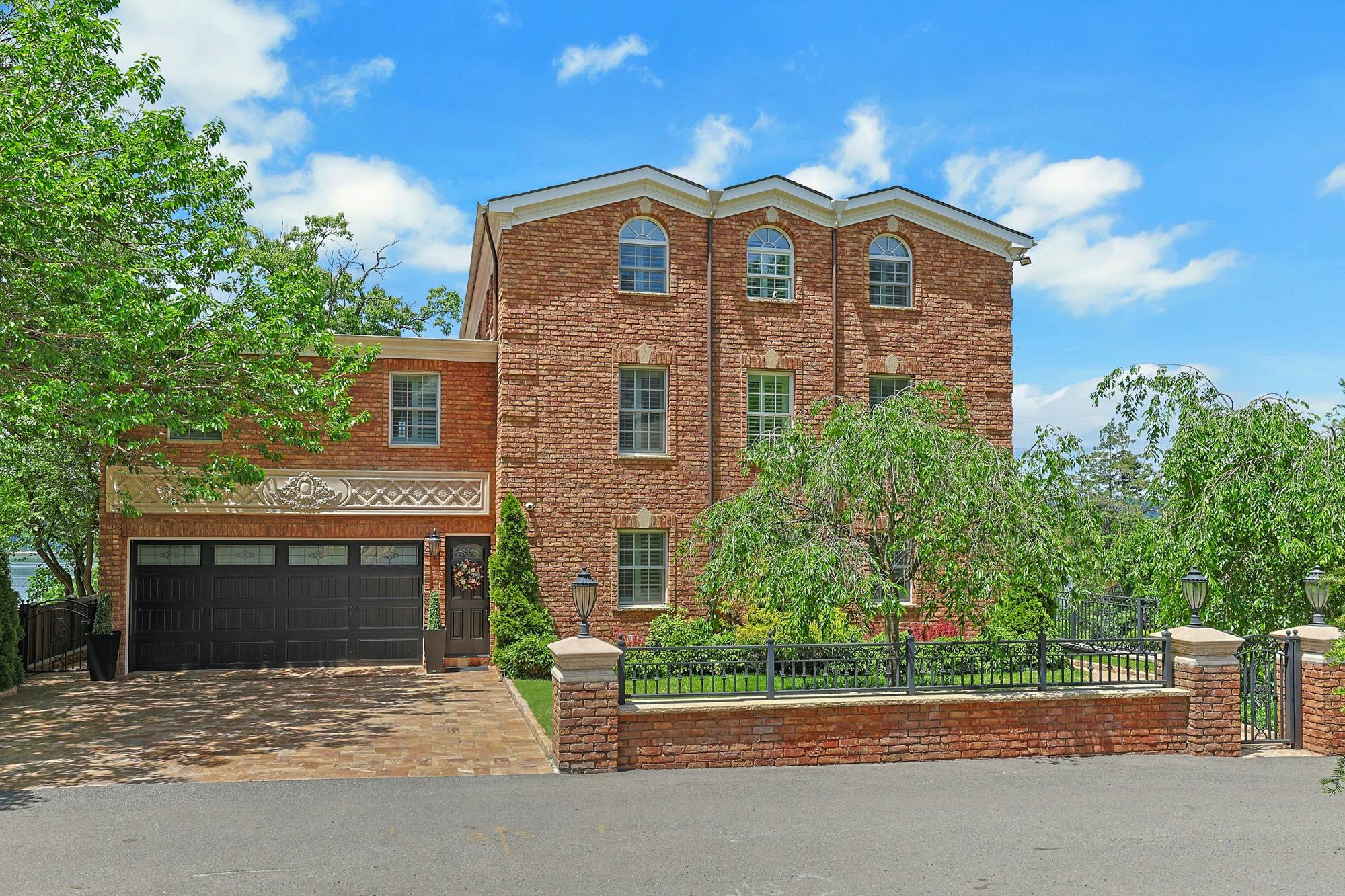 Spectacular Hudson River Views: Spacious & Modernized 4-Bd. Brick House with Decks, Patio, Outdoor Kitchen & Home Theater on Private Cul-de-Sac