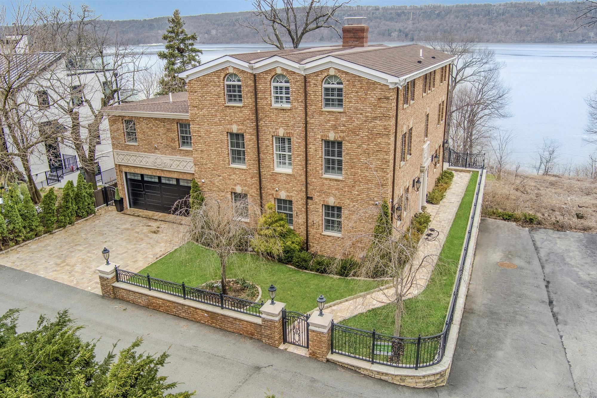 Spectacular Hudson River Views: Spacious & Modernized 4-Bd. Brick House with Decks, Patio, Outdoor Kitchen & Home Theater on Private Cul-de-Sac