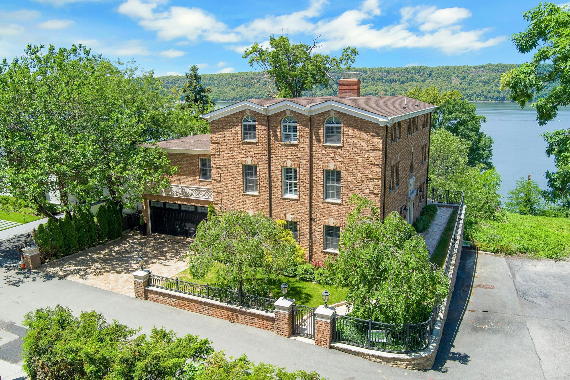 Spectacular Hudson River Views: Spacious & Modernized 4-Bd. Brick House with Decks, Patio, Outdoor Kitchen & Home Theater on Private Cul-de-Sac