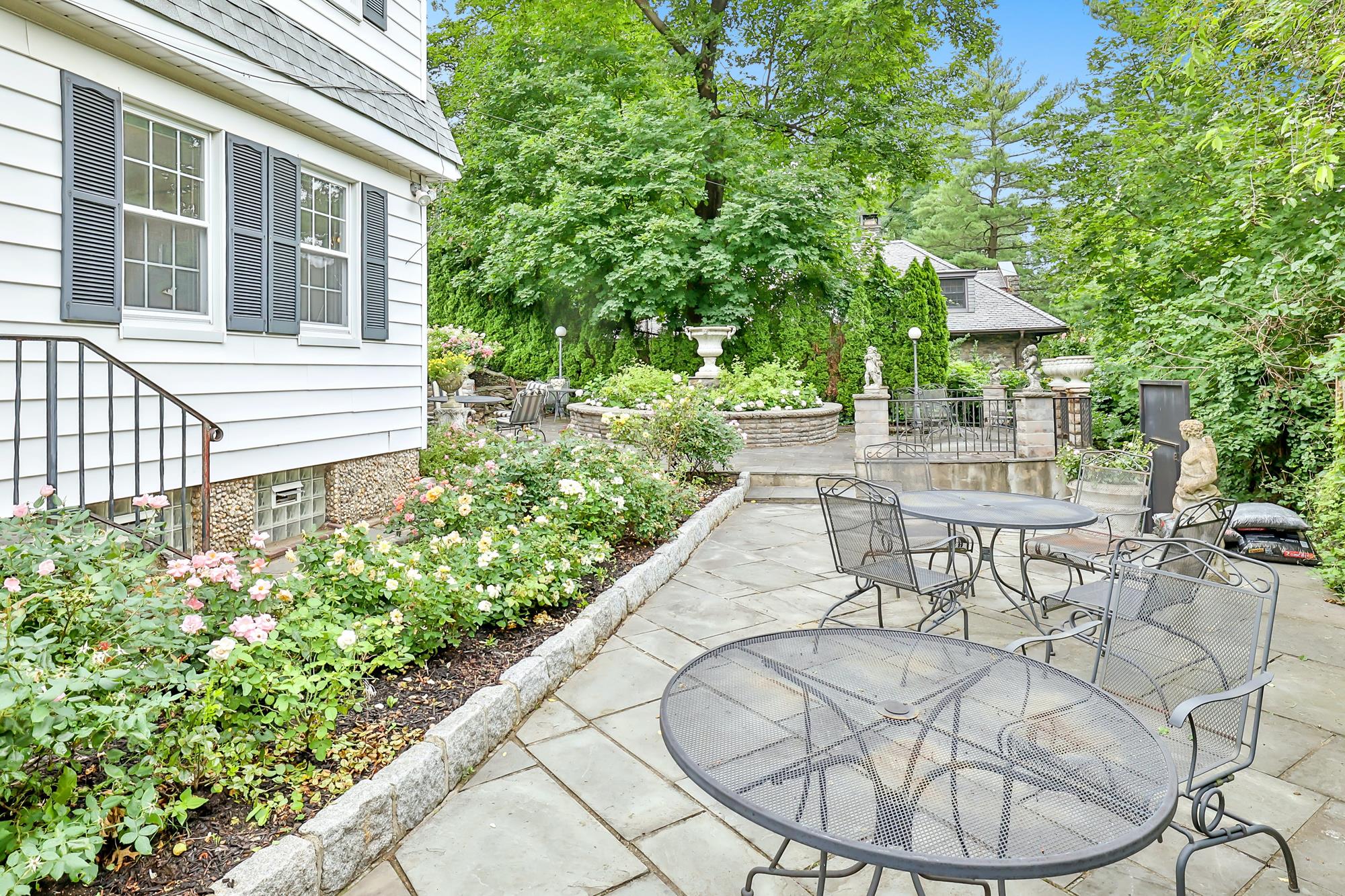 4Bd. Dutch CenterHall Colonial with Landscaped Garden & Wraparound Patio on Leafy CuldeSac