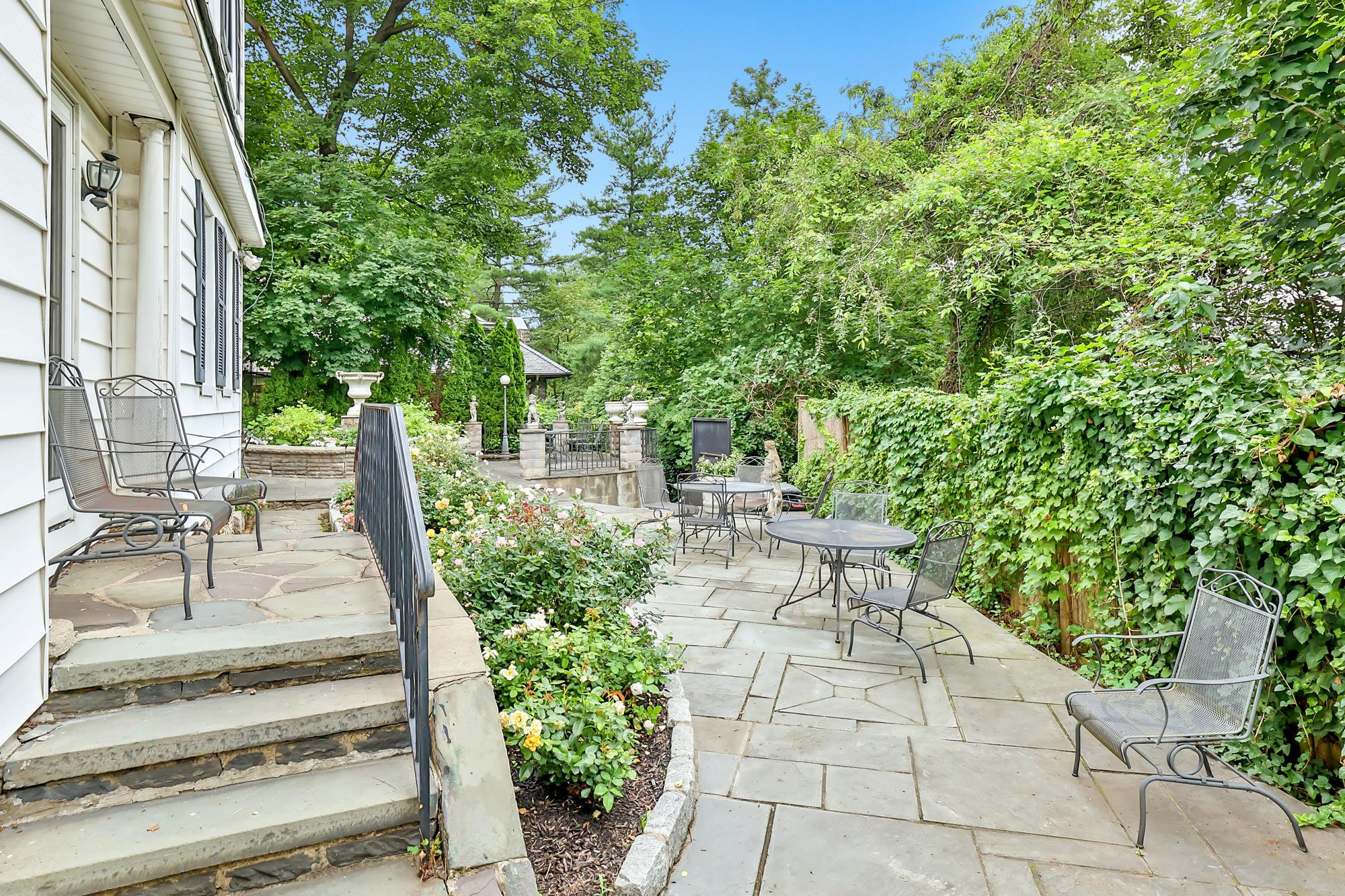 4Bd. Dutch CenterHall Colonial with Landscaped Garden & Wraparound Patio on Leafy CuldeSac