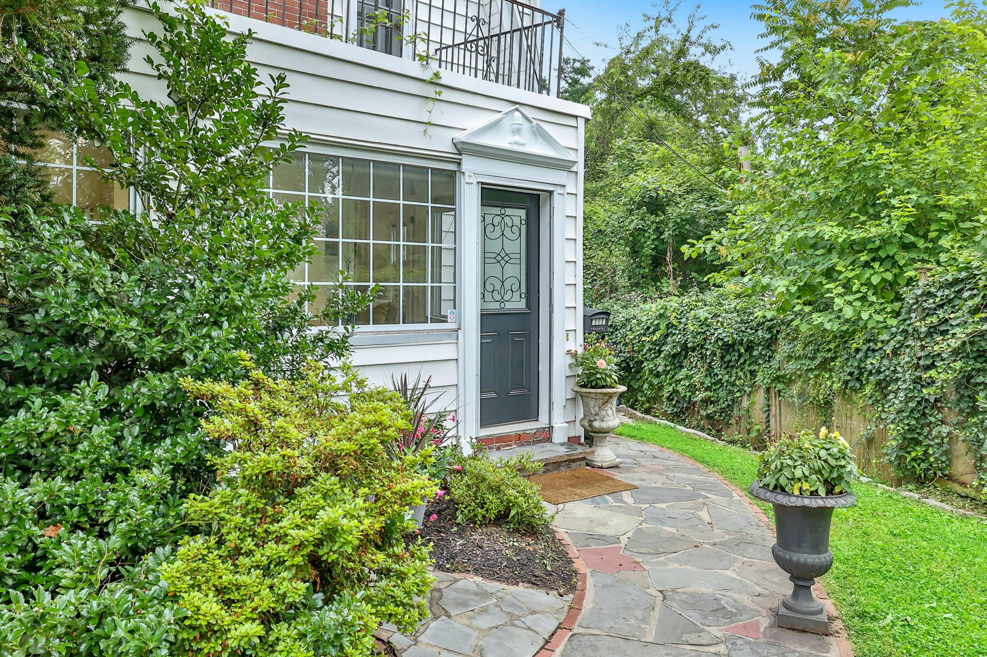 4-Bd. Dutch Center-Hall Colonial with Landscaped Garden & Wraparound Patio on Leafy Cul-de-Sac