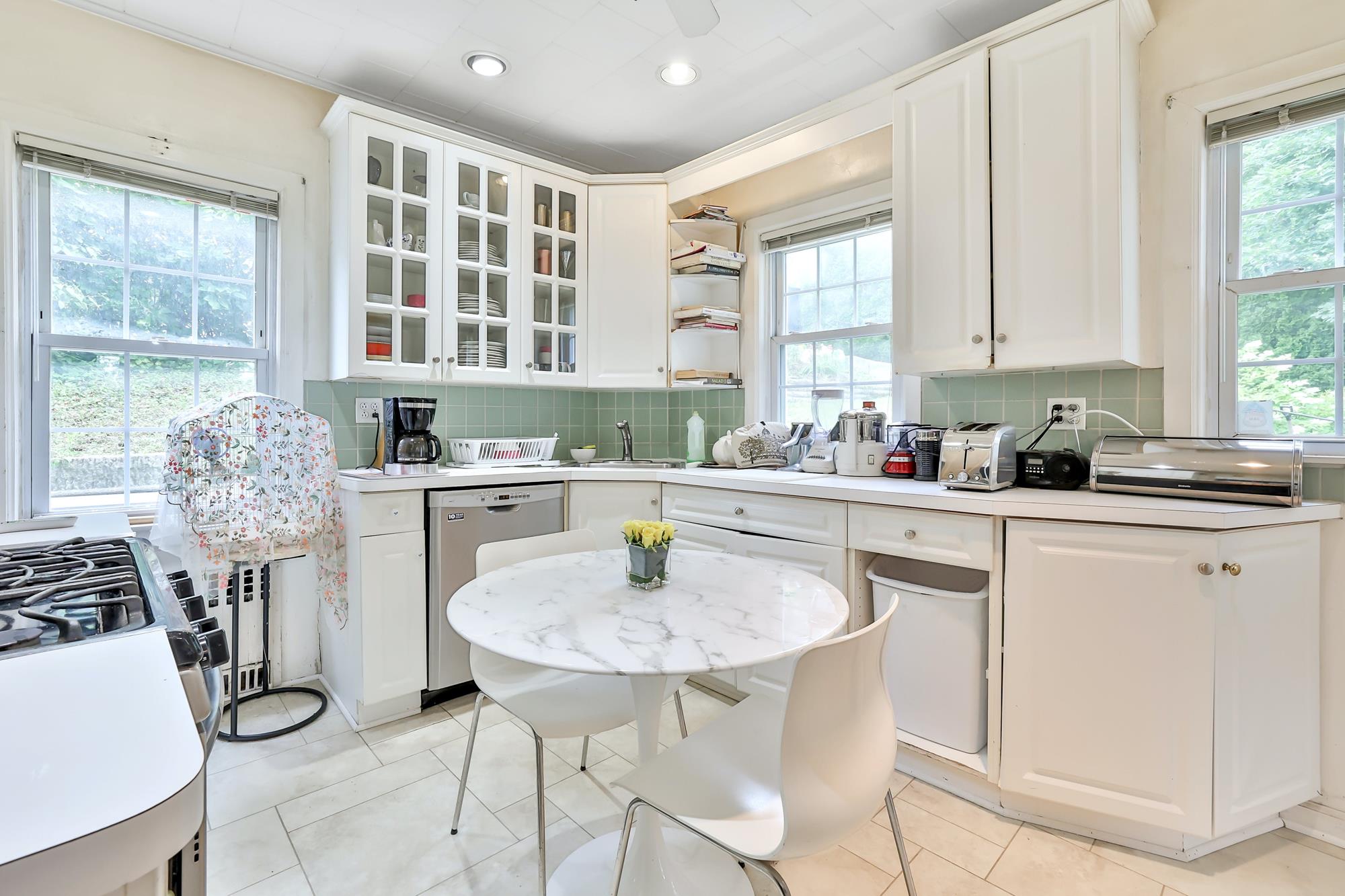 4-Bd. Dutch Center-Hall Colonial with Landscaped Garden & Wraparound Patio on Leafy Cul-de-Sac