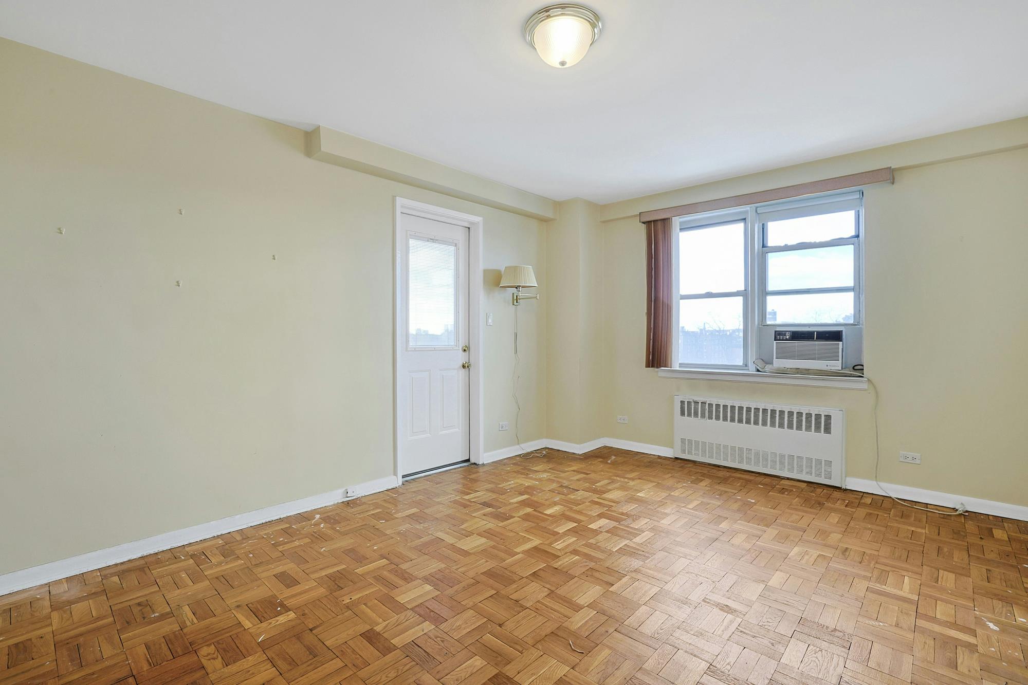 Sunny & Spacious 2-Bd. (Convertible 3-Bd.) Co-op with Balcony, Pool & 24-Hr. Doormen at The Edmond Lee