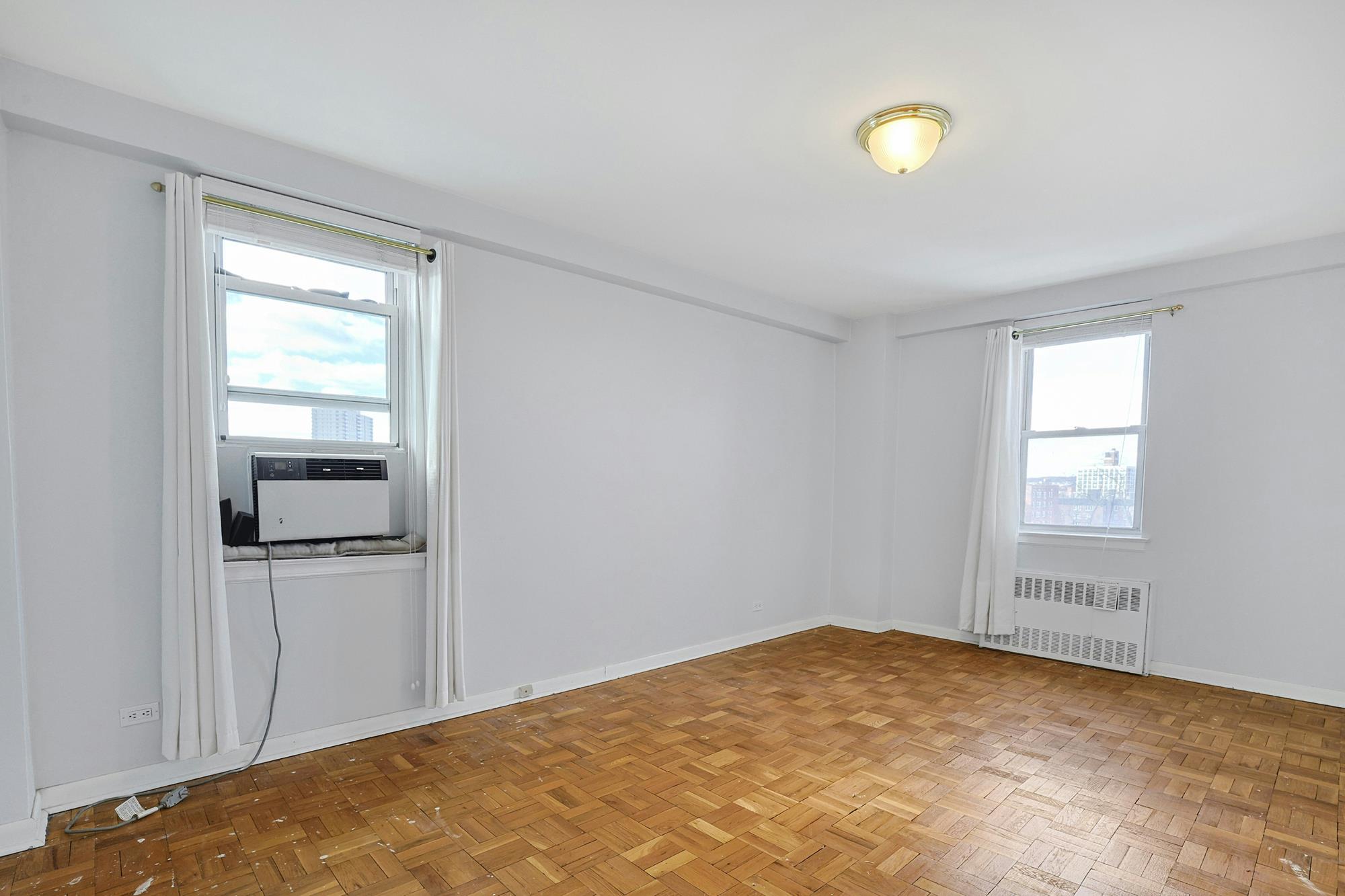 Sunny & Spacious 2-Bd. (Convertible 3-Bd.) Co-op with Balcony, Pool & 24-Hr. Doormen at The Edmond Lee