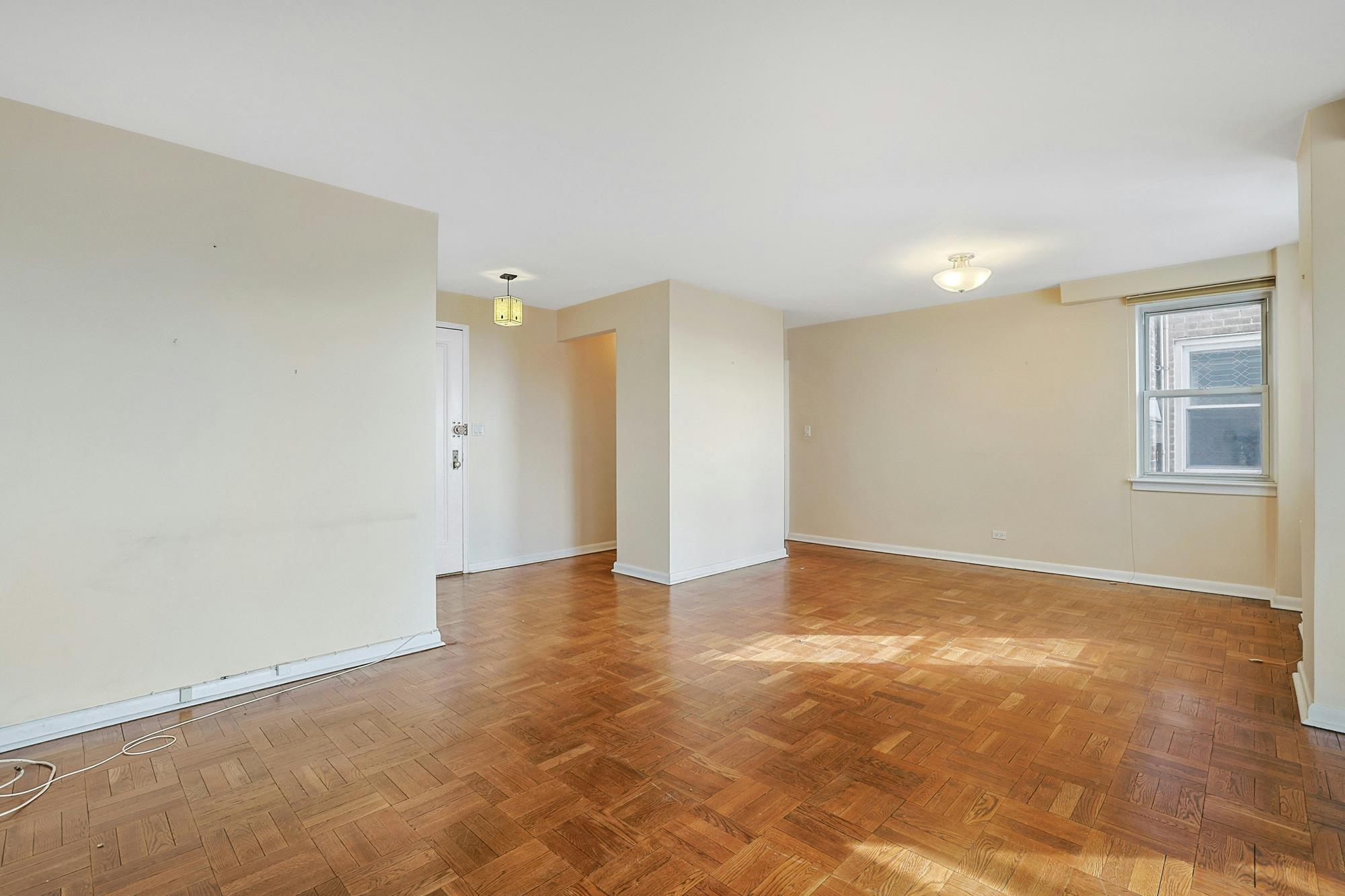 Sunny & Spacious 2-Bd. (Convertible 3-Bd.) Co-op with Balcony, Pool & 24-Hr. Doormen at The Edmond Lee