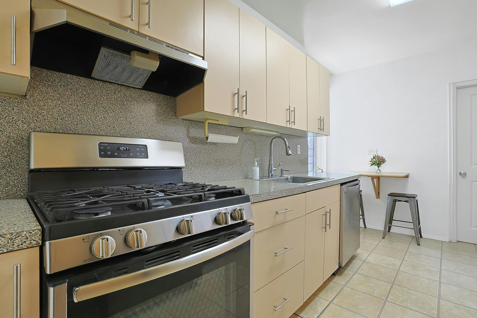 Bright & Spacious Junior-4 (Converted to 2-Bd.) Co-op with Balcony & Doormen at The Georgian