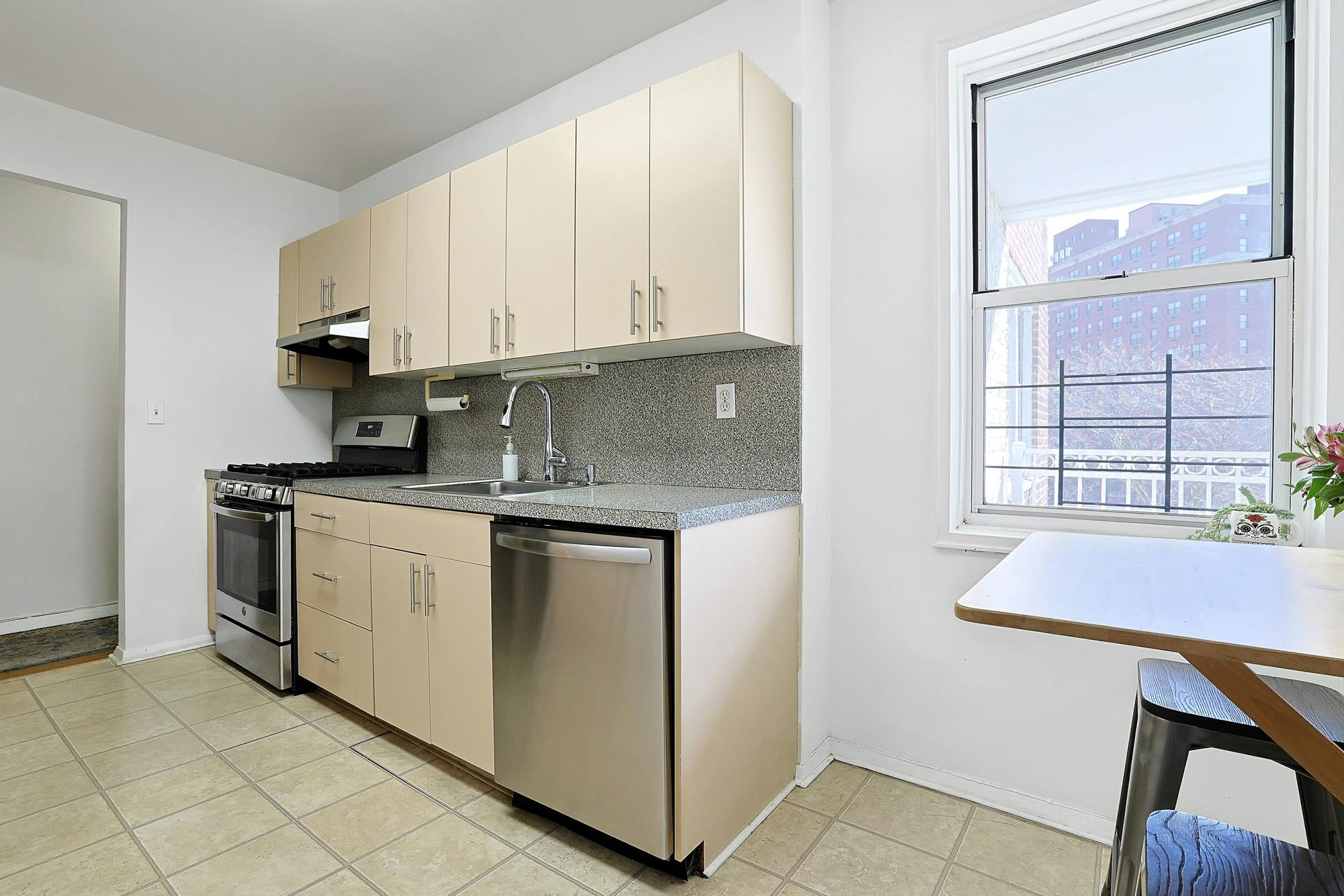 Bright & Spacious Junior-4 (Converted to 2-Bd.) Co-op with Balcony & Doormen at The Georgian