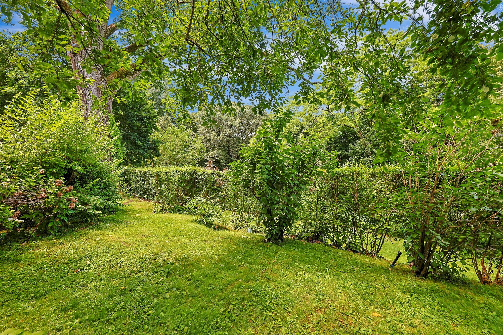 Spacious & Newly Renovated Triplex Townhouse with Luxe Condo Amenities, Seasonal Water Views, Deck, Garden & 2 Parking Spaces on Cul-de-Sac