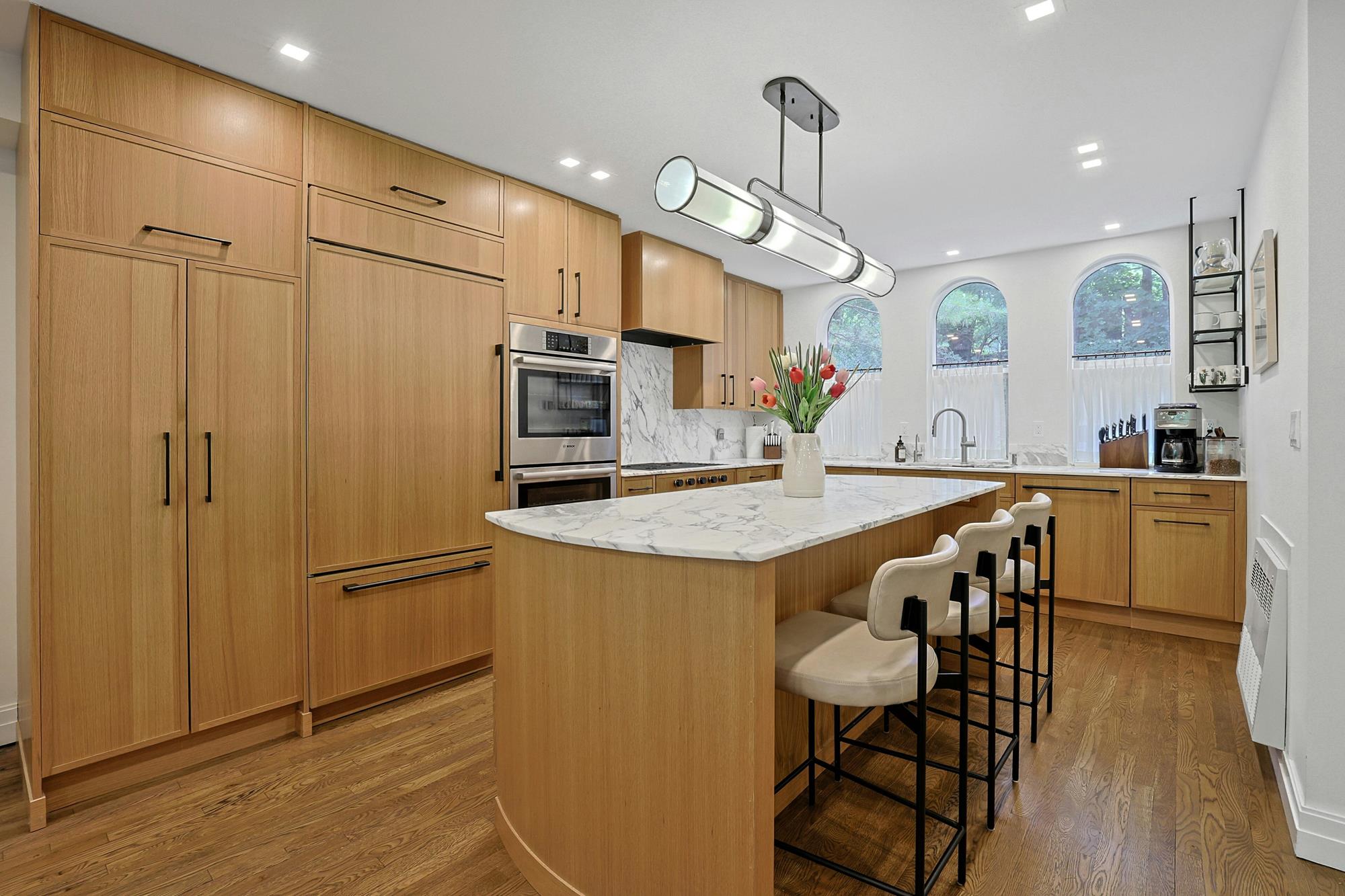 Spacious & Newly Renovated Triplex Townhouse with Luxe Condo Amenities, Seasonal Water Views, Deck, Garden & 2 Parking Spaces on Cul-de-Sac