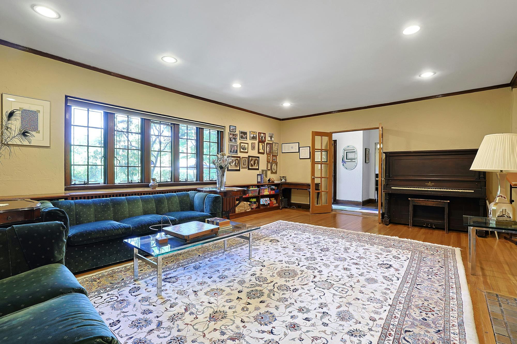 Classic & Spacious 5-Bd. Center-Hall Medieval Revival-Style House with Patio & Grassy Yard
