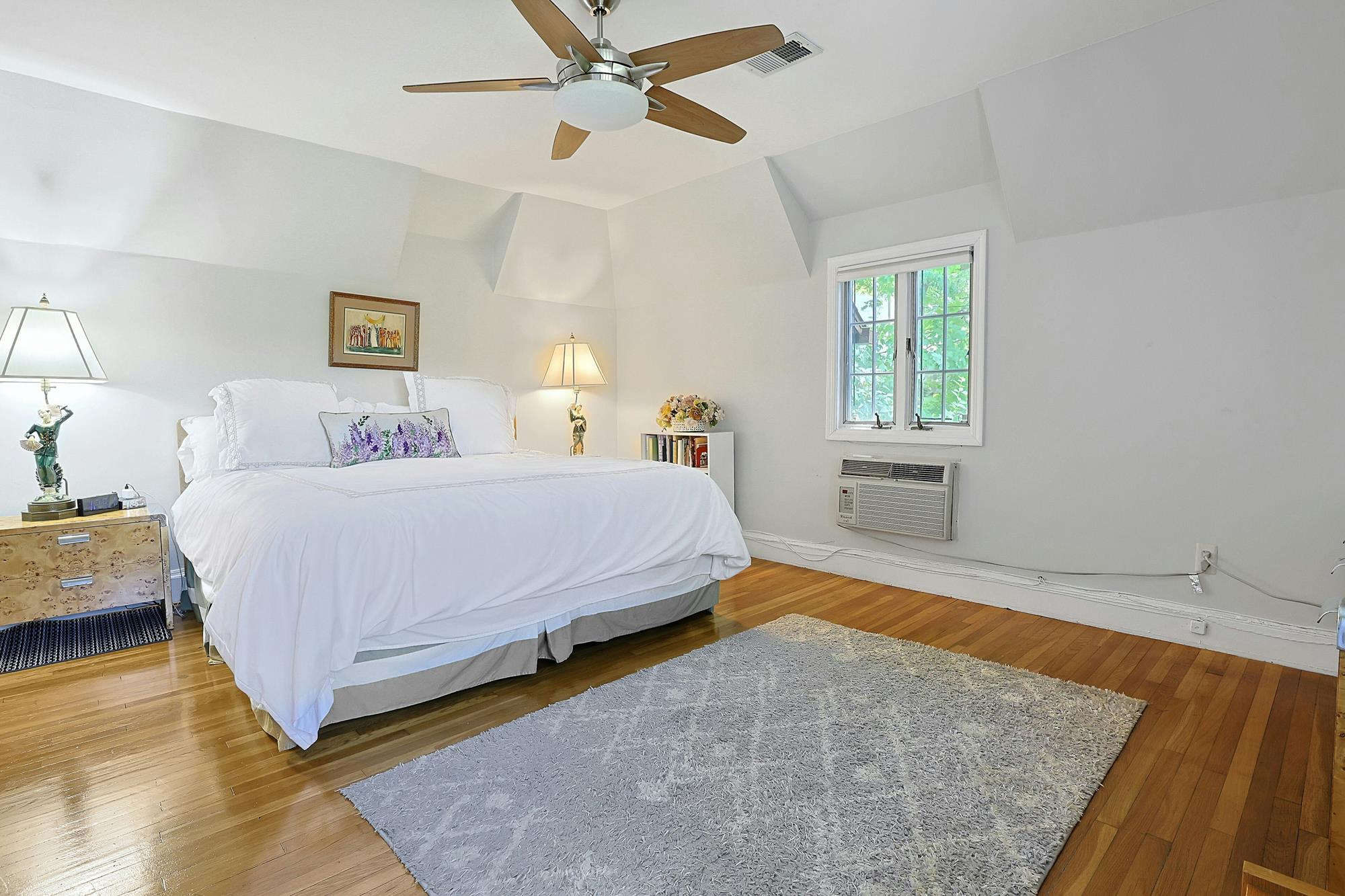 Classic & Spacious 5-Bd. Center-Hall Medieval Revival-Style House with Patio & Grassy Yard