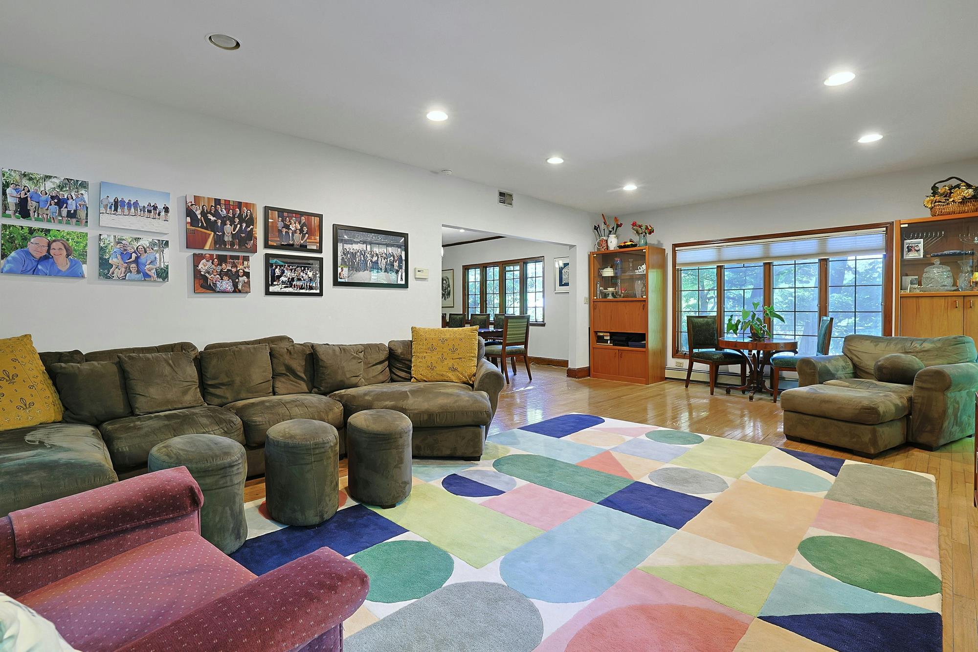 Classic & Spacious 5-Bd. Center-Hall Medieval Revival-Style House with Patio & Grassy Yard