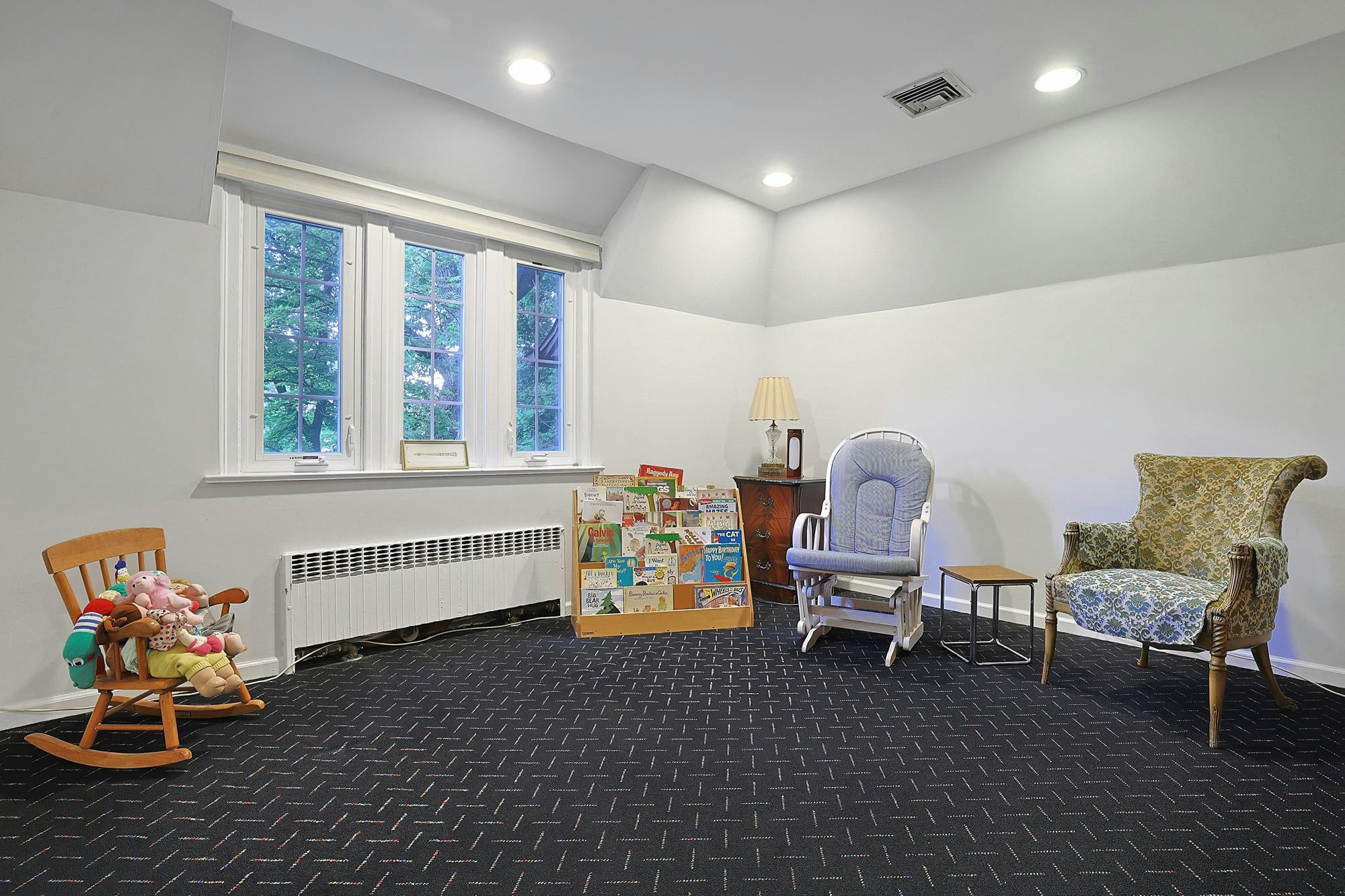 Classic & Spacious 5-Bd. Center-Hall Medieval Revival-Style House with Patio & Grassy Yard