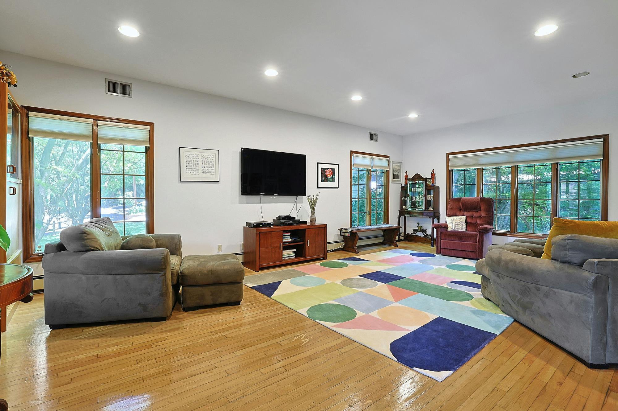 Classic & Spacious 5-Bd. Center-Hall Medieval Revival-Style House with Patio & Grassy Yard