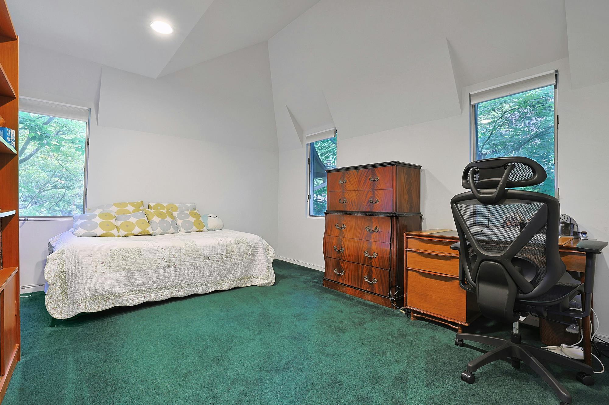 Classic & Spacious 5-Bd. Center-Hall Medieval Revival-Style House with Patio & Grassy Yard
